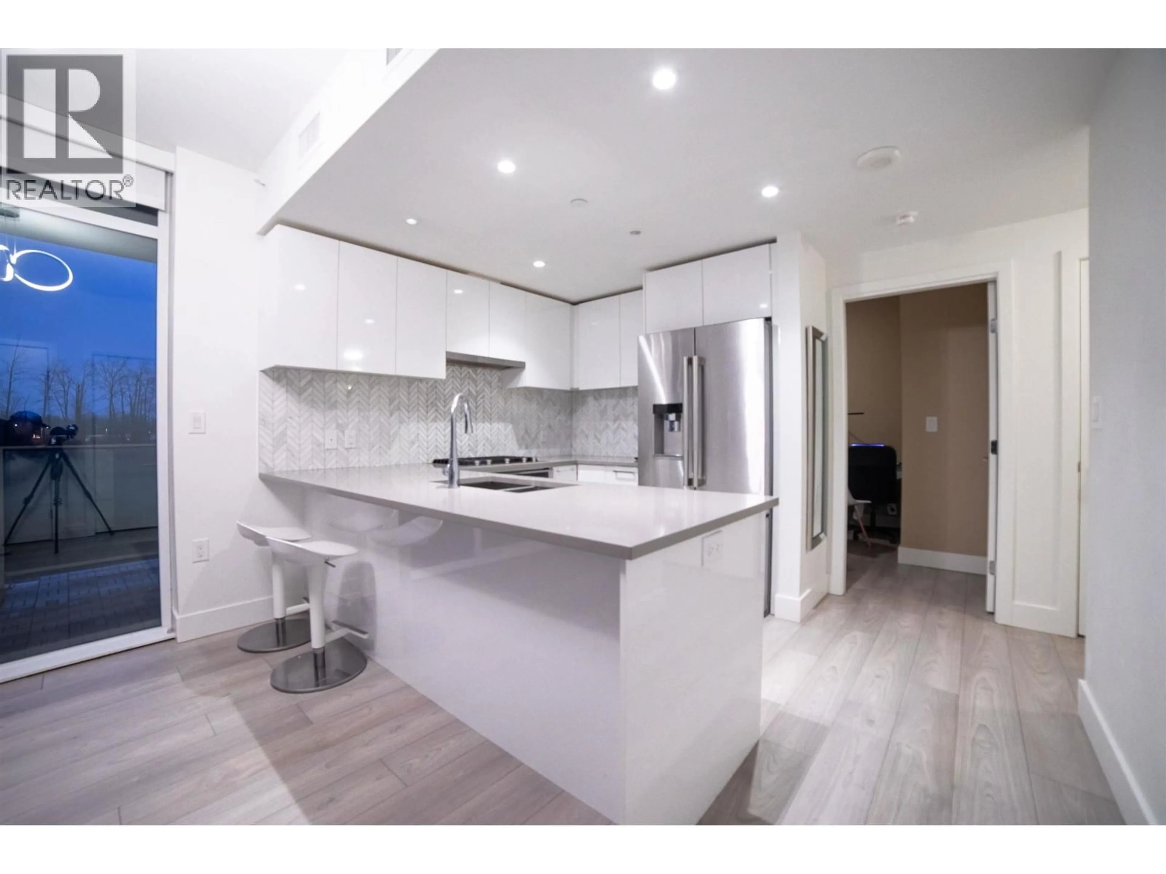 Open concept kitchen, ceramic/tile floor for 201 - 3581 KENT AVENUE, Vancouver British Columbia V5S0H6