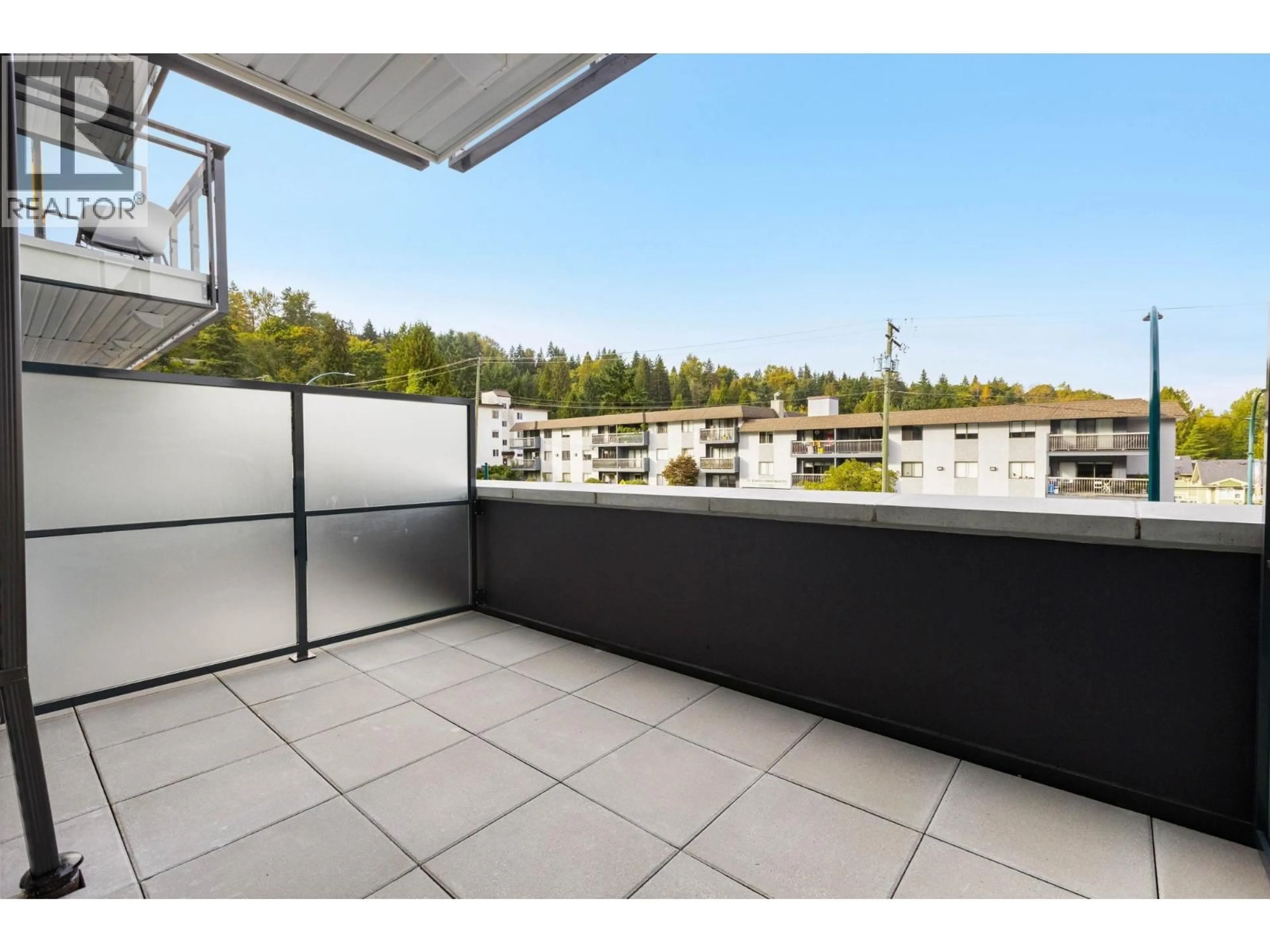 Balcony in the apartment, city buildings view from balcony for 210 - 2015 ST. JOHNS STREET, Port Moody British Columbia V3H0N5