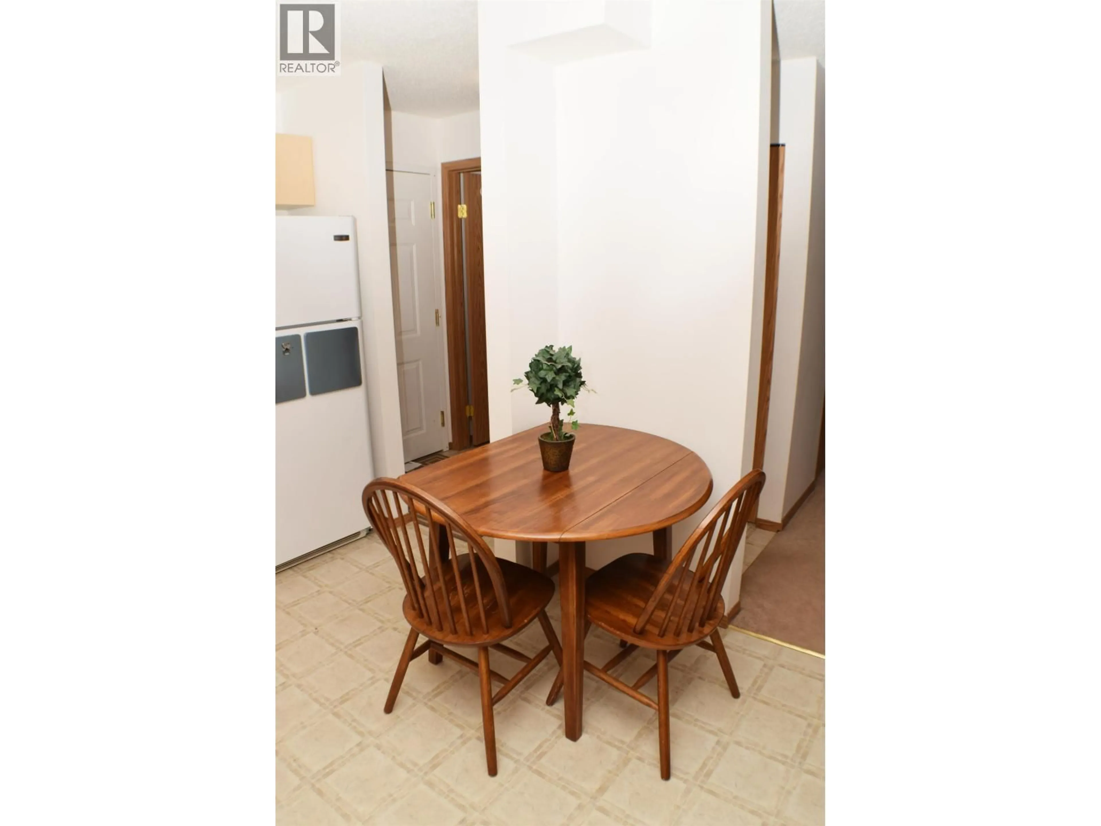 Dining room, wood/laminate floor for 305 - 8507 86 STREET, Fort St. John British Columbia V1J6W6