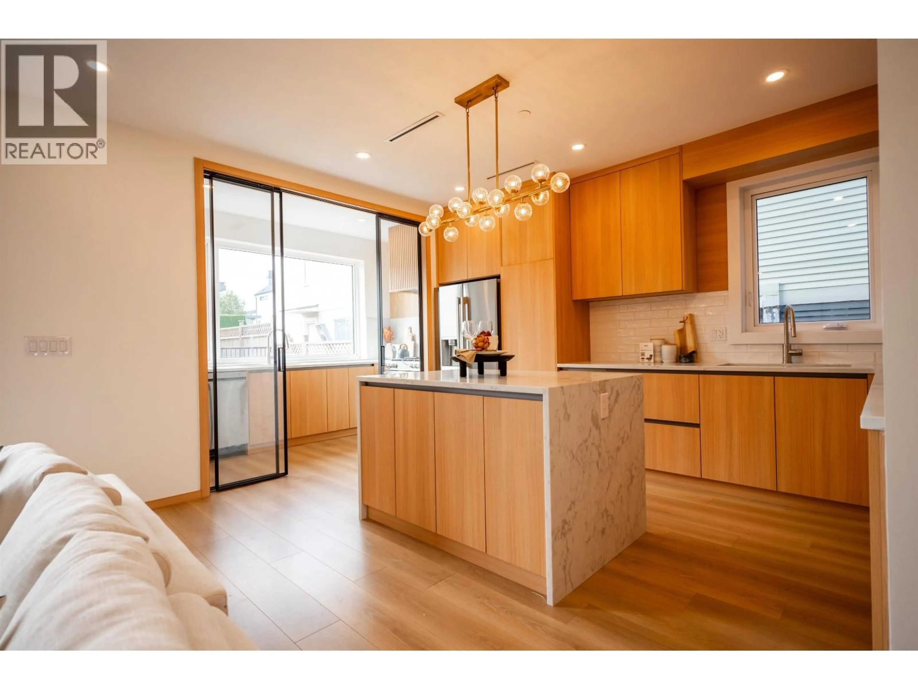 Open concept kitchen, wood/laminate floor for 7 HOWARD AVENUE, Burnaby British Columbia V5B1J6