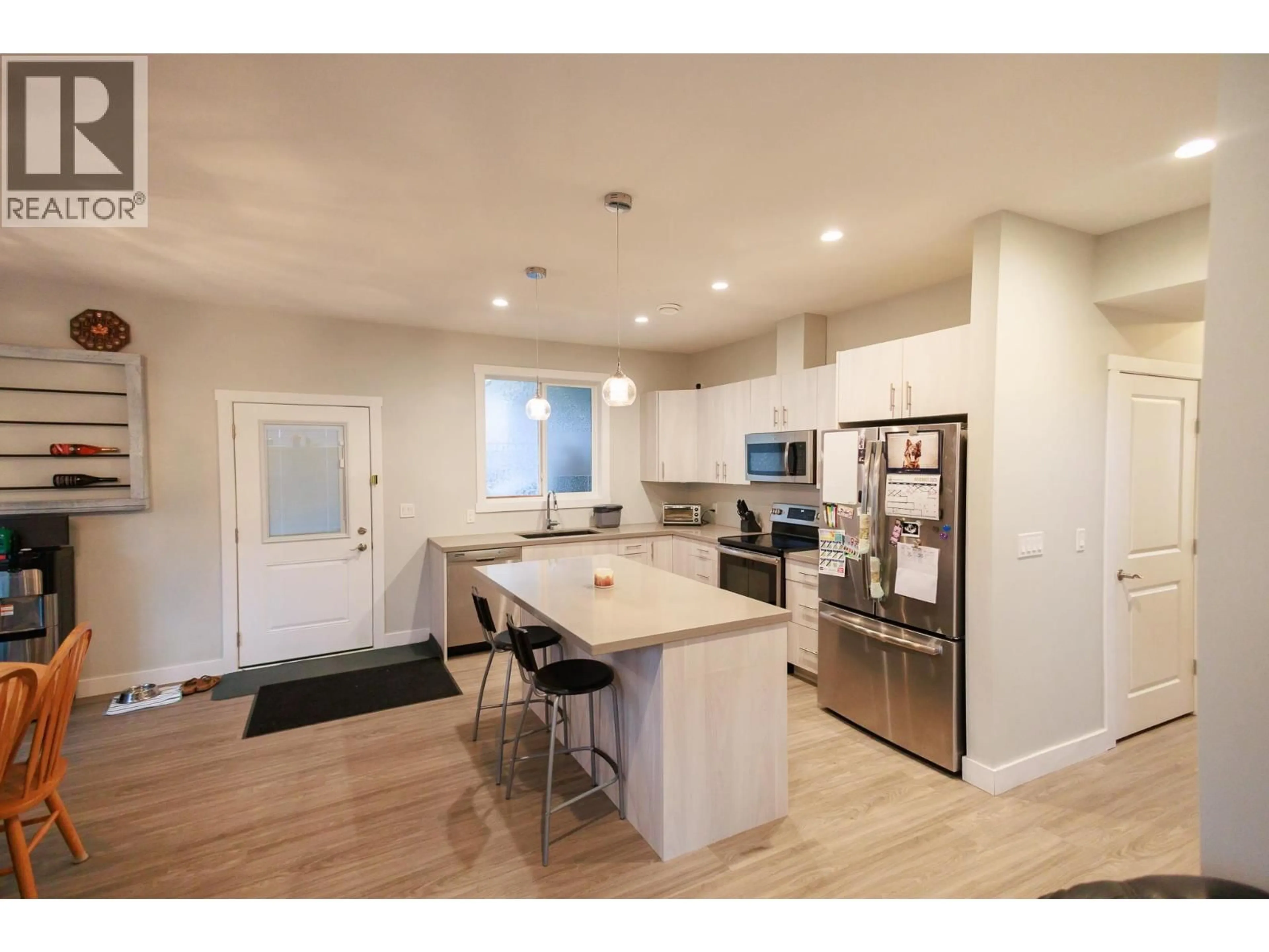 Open concept kitchen, wood/laminate floor for 5223 SMITH AVENUE, Terrace British Columbia V8G0H1