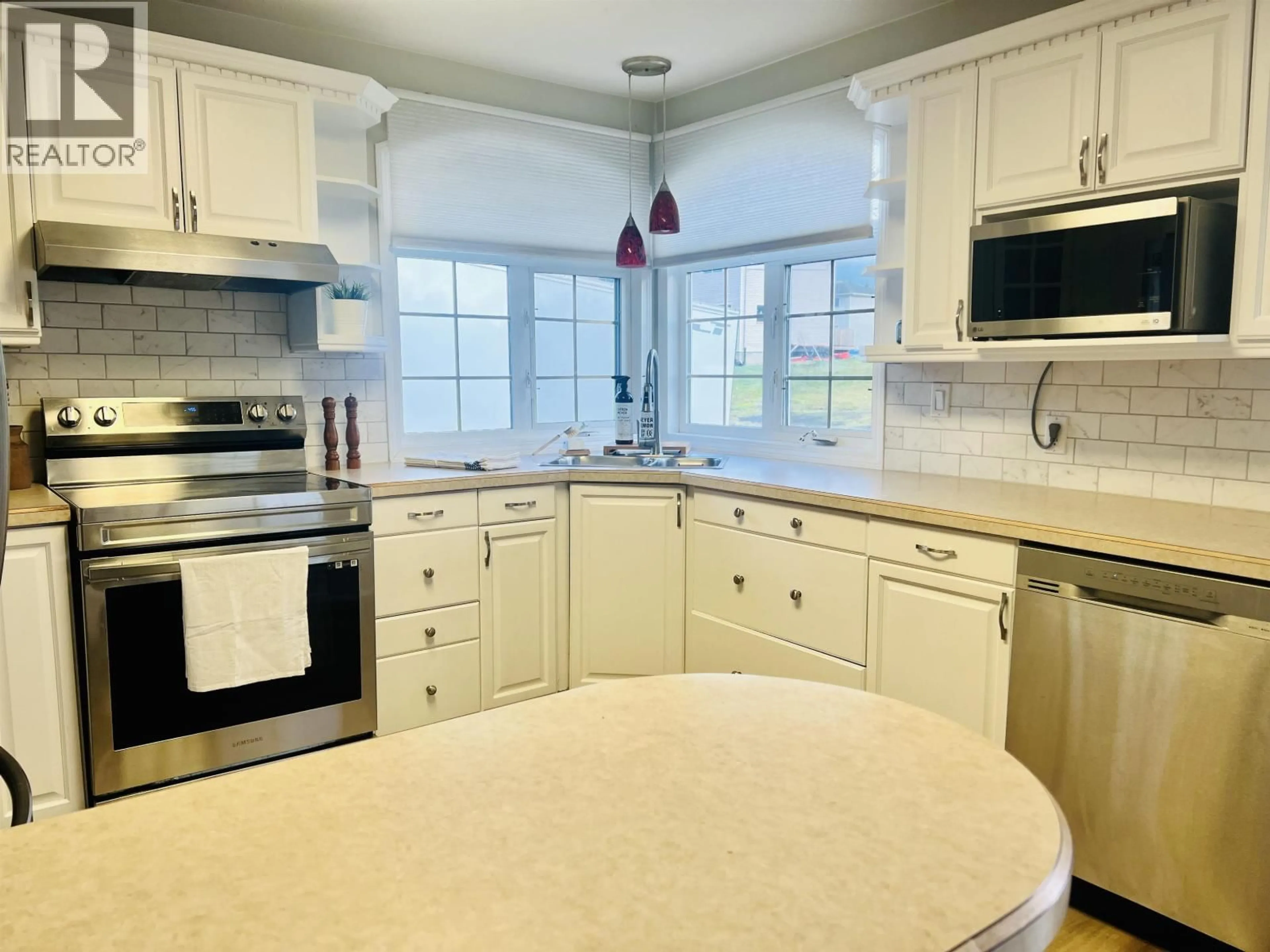 Open concept kitchen, ceramic/tile floor for 103 STIKINE STREET, Kitimat British Columbia V8C1W6
