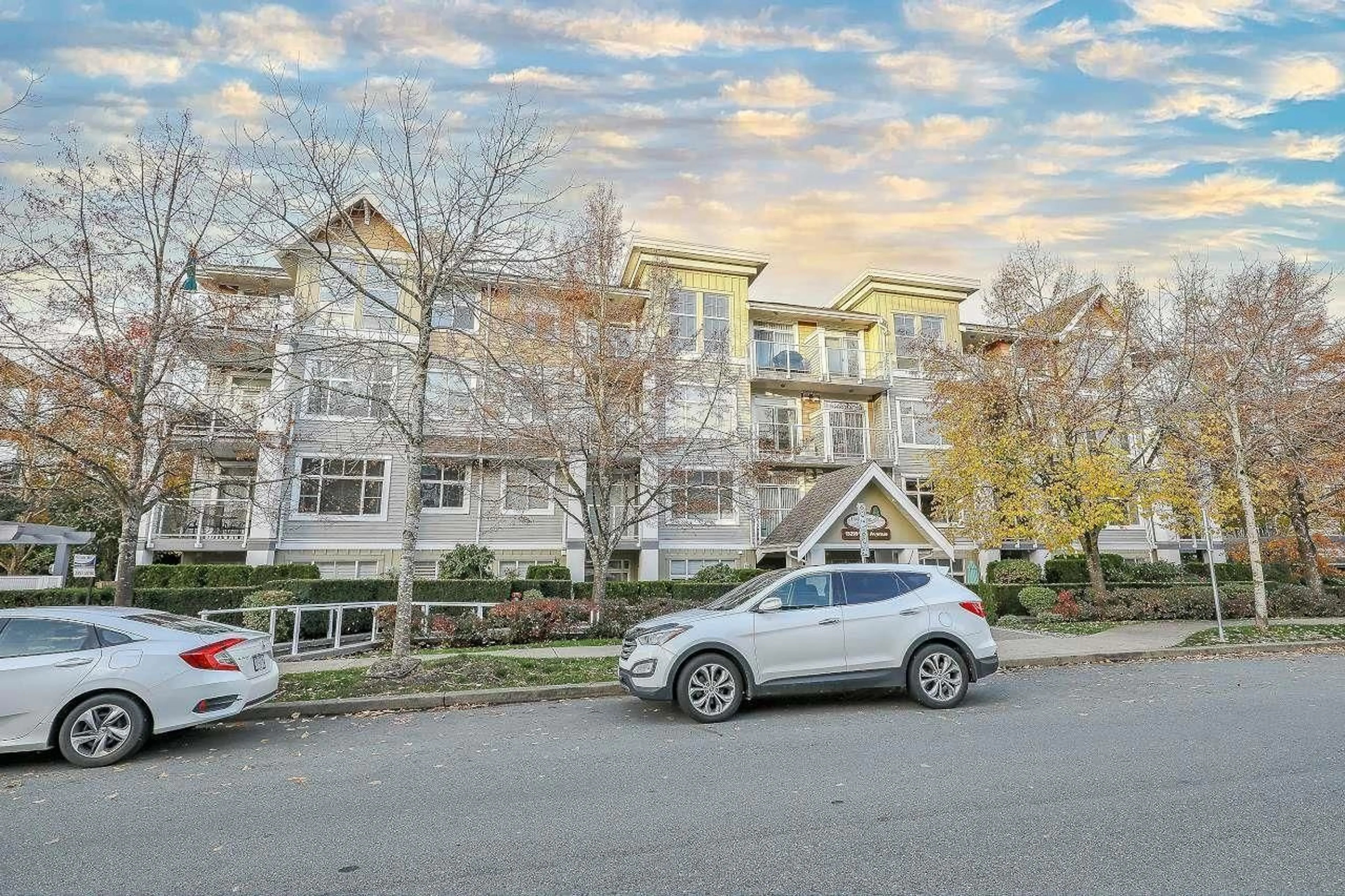 A pic from outside/outdoor area/front of a property/back of a property/a pic from drone, street for 407 - 15299 17A, Surrey British Columbia V4A1V4