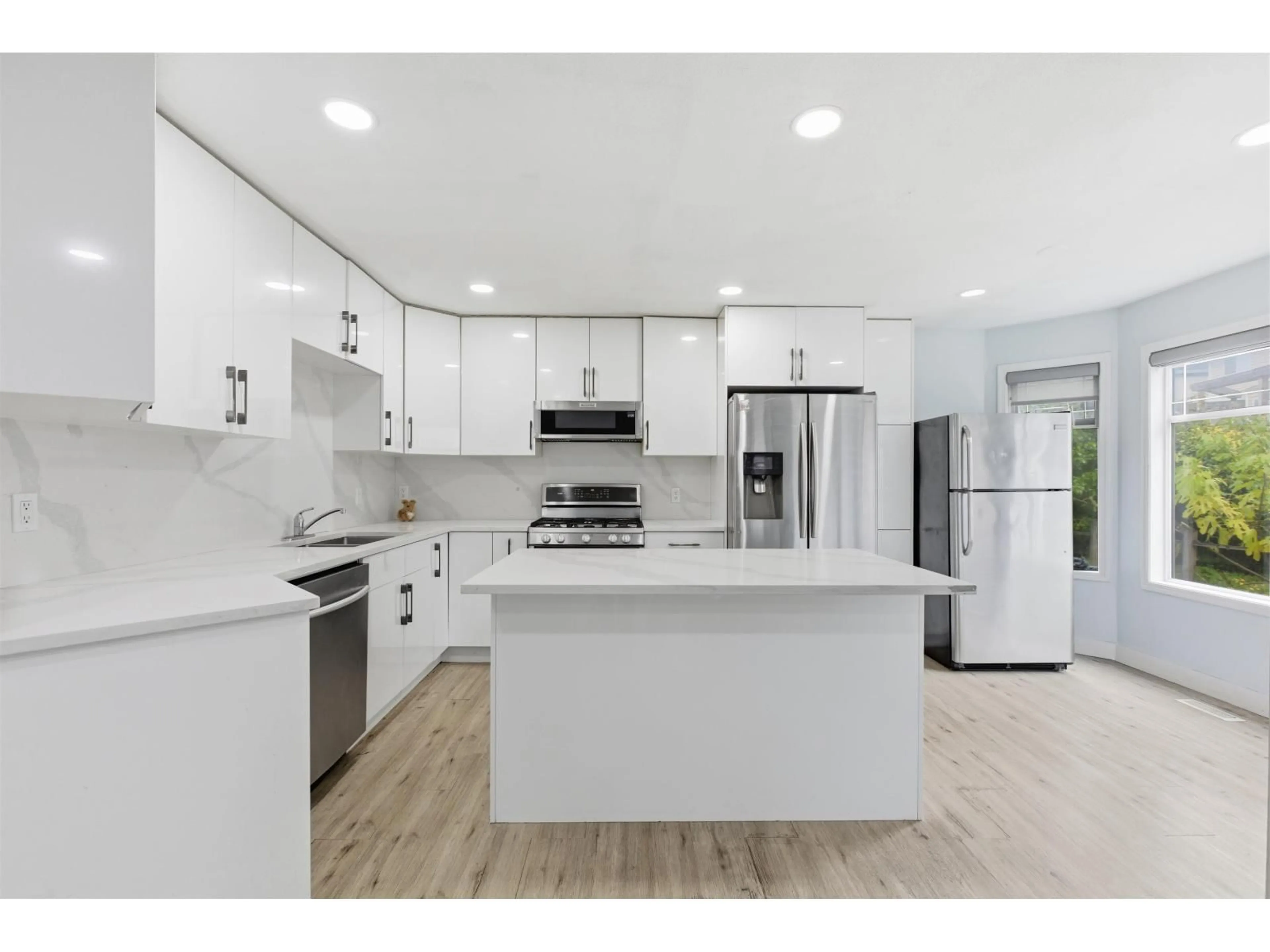 Open concept kitchen, ceramic/tile floor for 11142 85A, Delta British Columbia V4C7C8