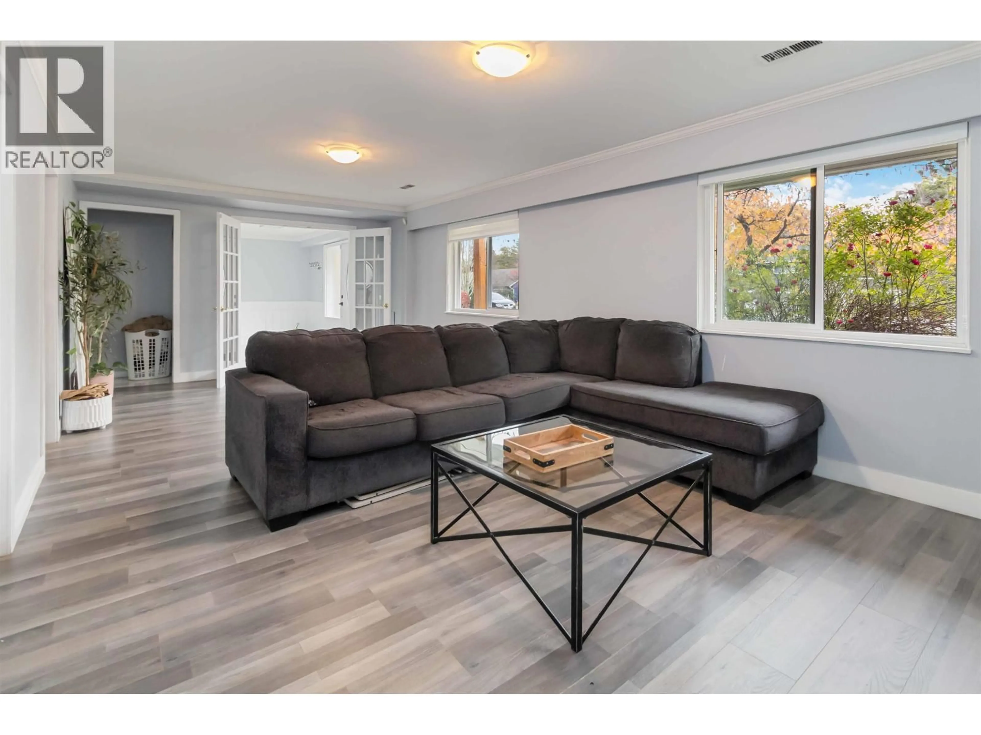 Living room with furniture, unknown for 5237 12 AVENUE, Tsawwassen British Columbia V4M2B1