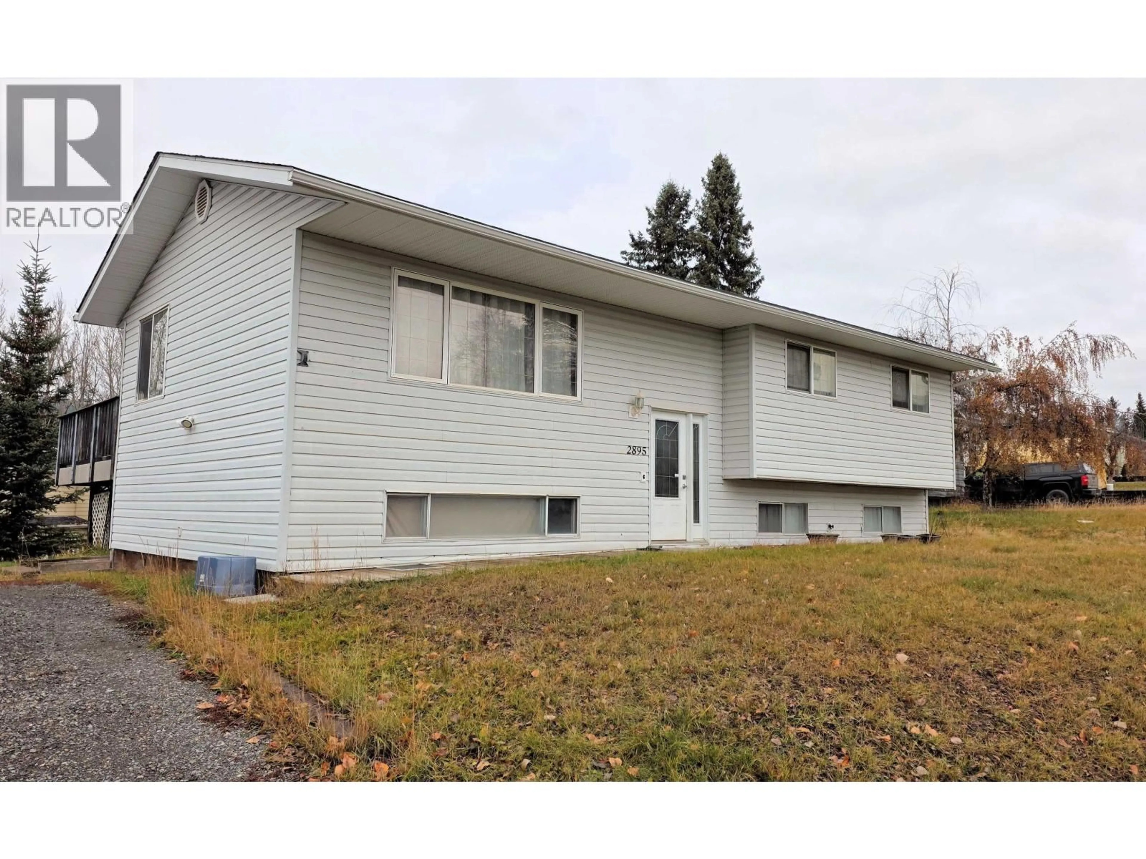 Home with vinyl exterior material, street for 2895 PEARSON ROAD, Houston British Columbia V0J1Z0