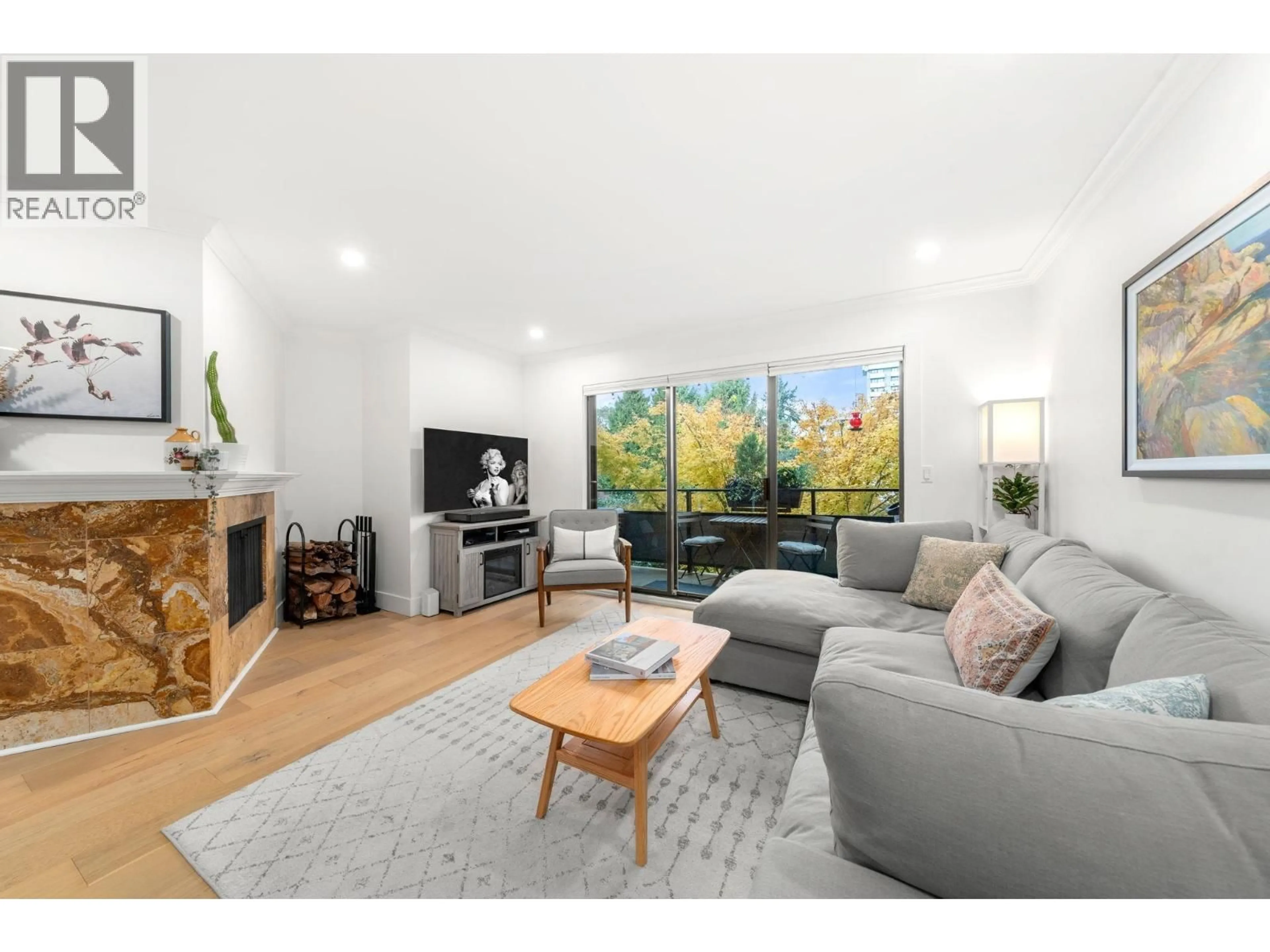 Living room with furniture, wood/laminate floor for 201 - 1130 13TH AVENUE, Vancouver British Columbia V6H1N3