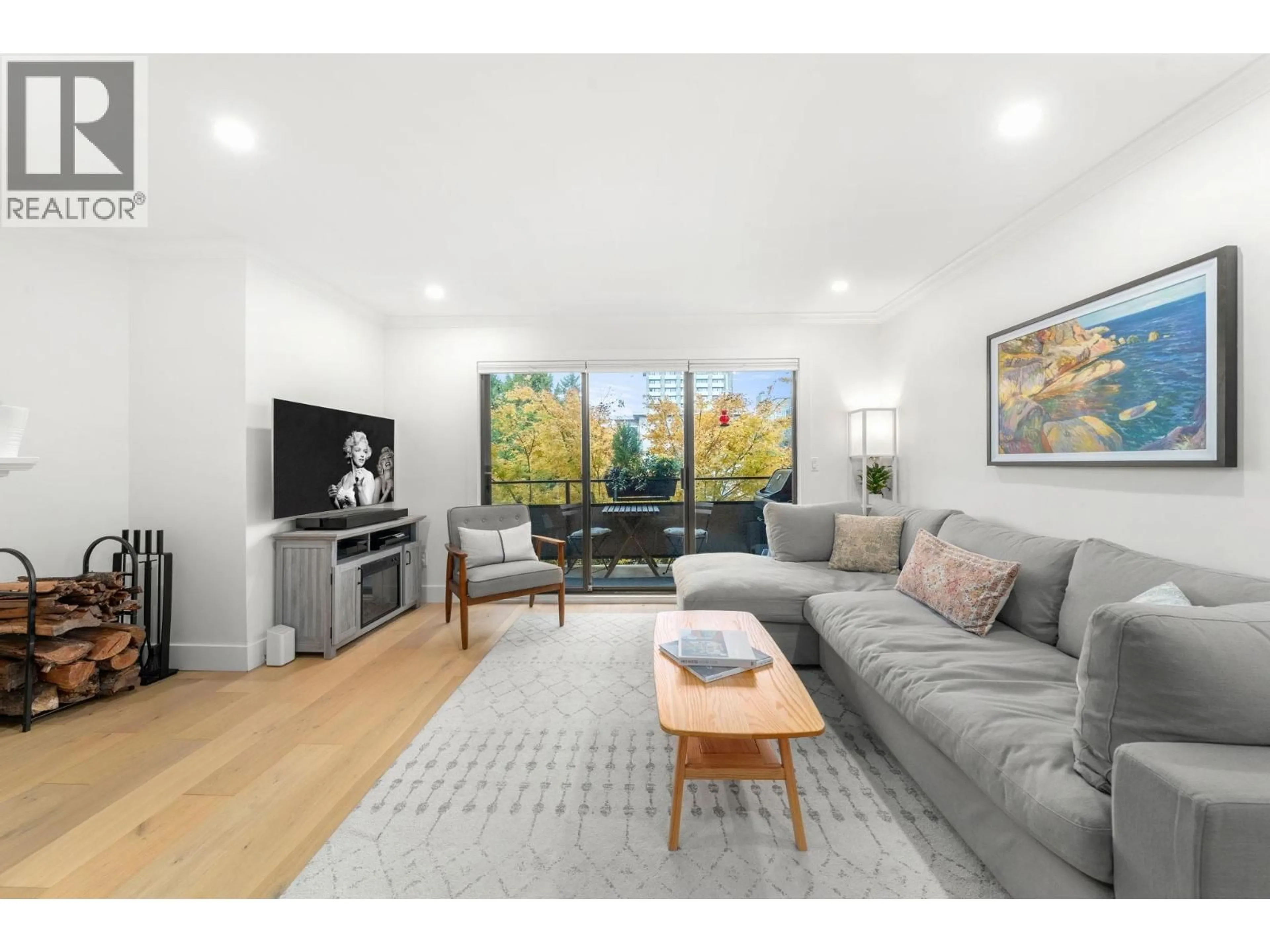 Living room with furniture, wood/laminate floor for 201 - 1130 13TH AVENUE, Vancouver British Columbia V6H1N3