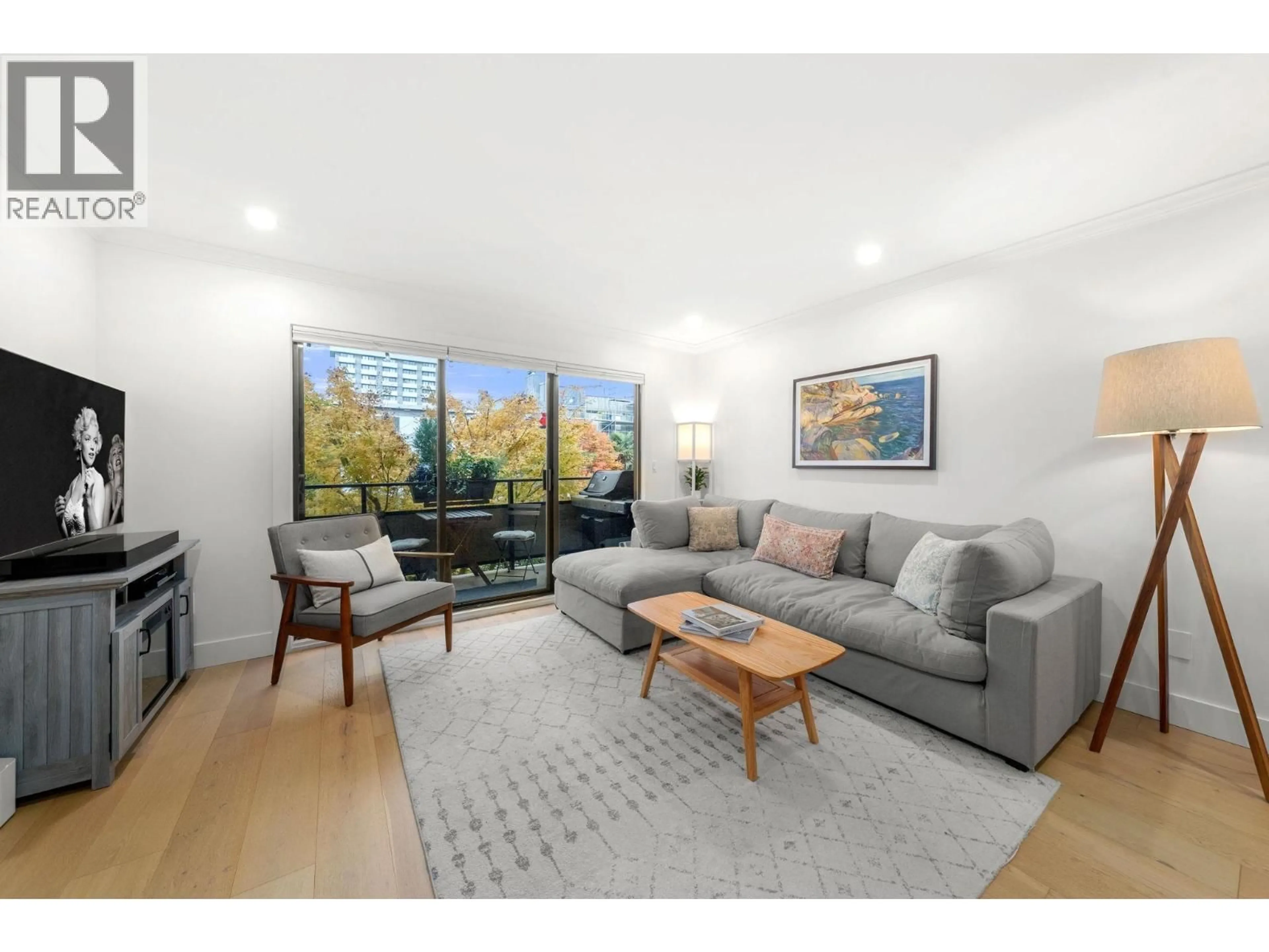 Living room with furniture, wood/laminate floor for 201 - 1130 13TH AVENUE, Vancouver British Columbia V6H1N3