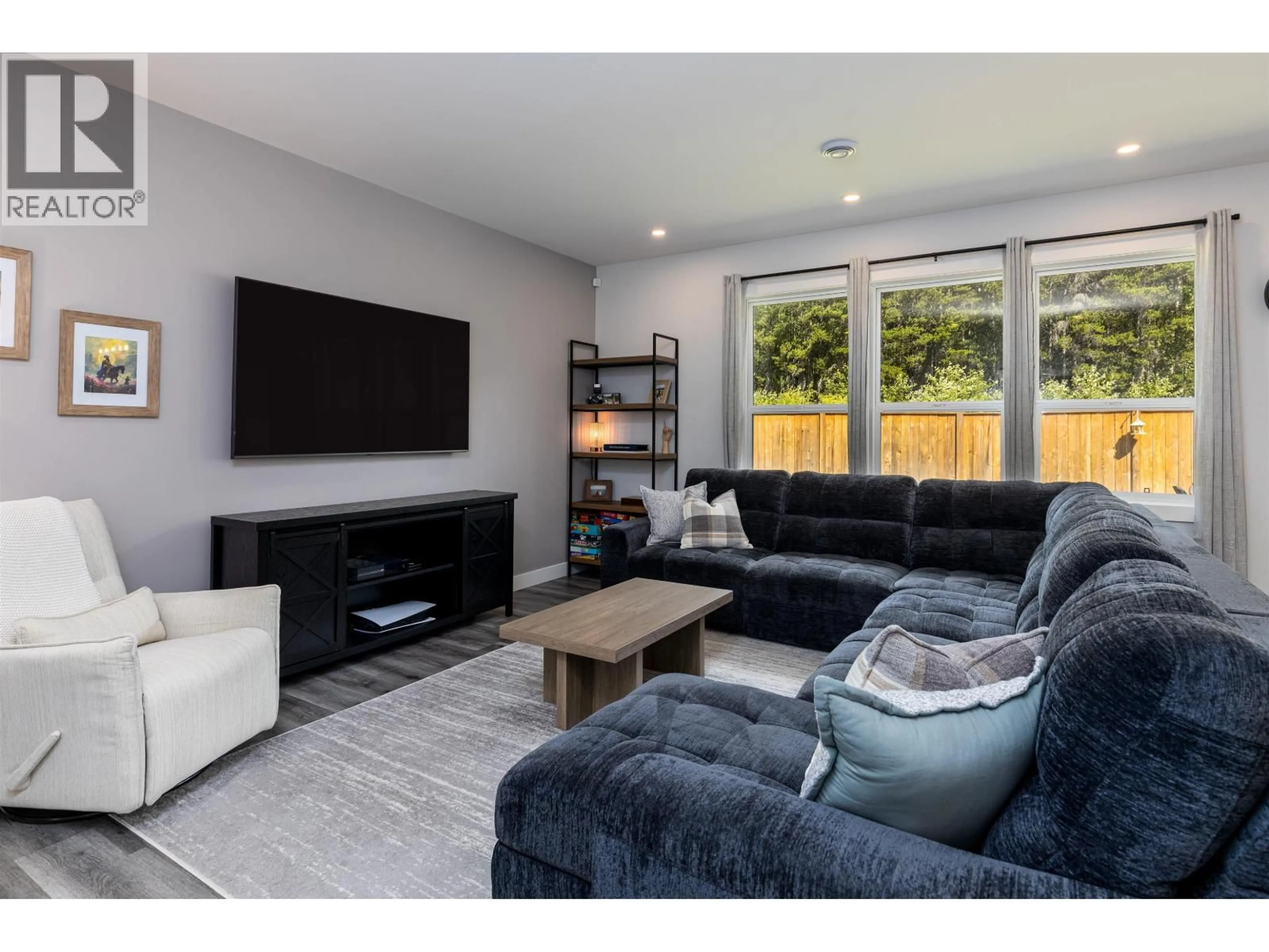 Living room with furniture, wood/laminate floor for 5238 SMITH AVENUE, Terrace British Columbia V8G0H1