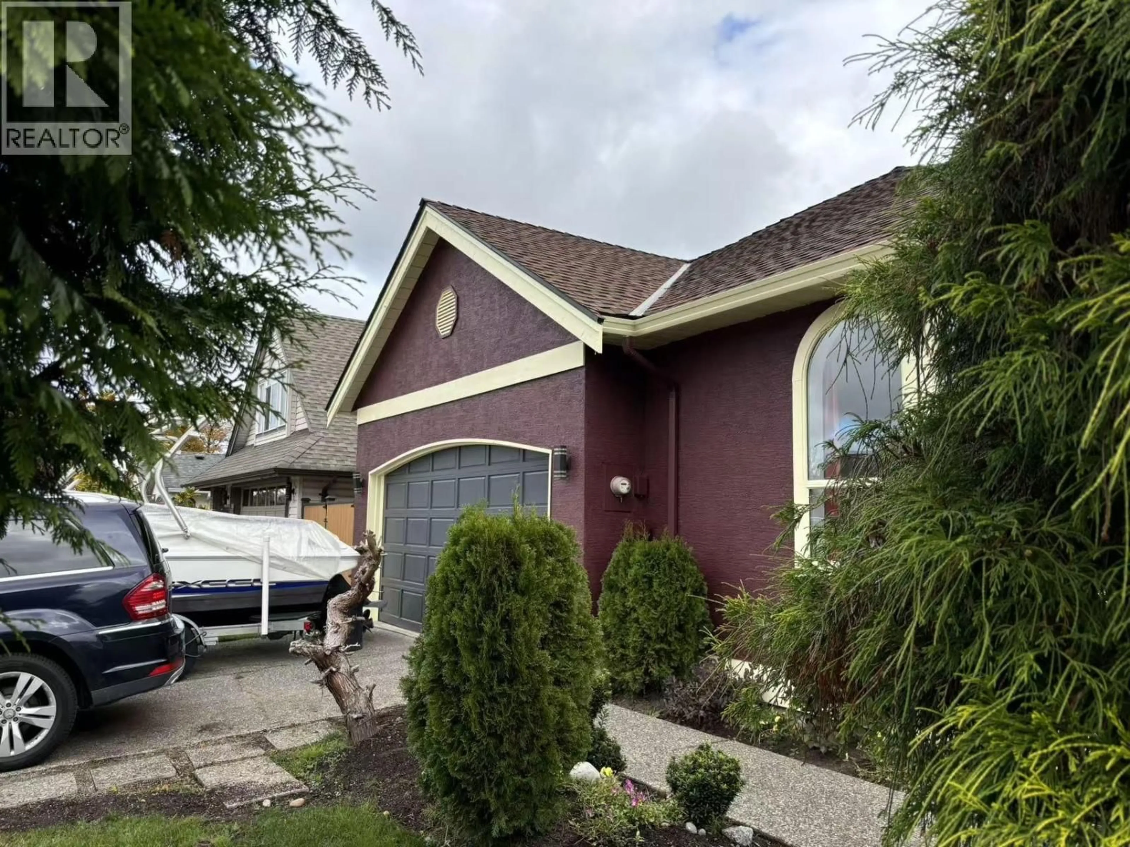 Home with vinyl exterior material, street for 1658 GOLF CLUB DRIVE, Delta British Columbia V4M4E2