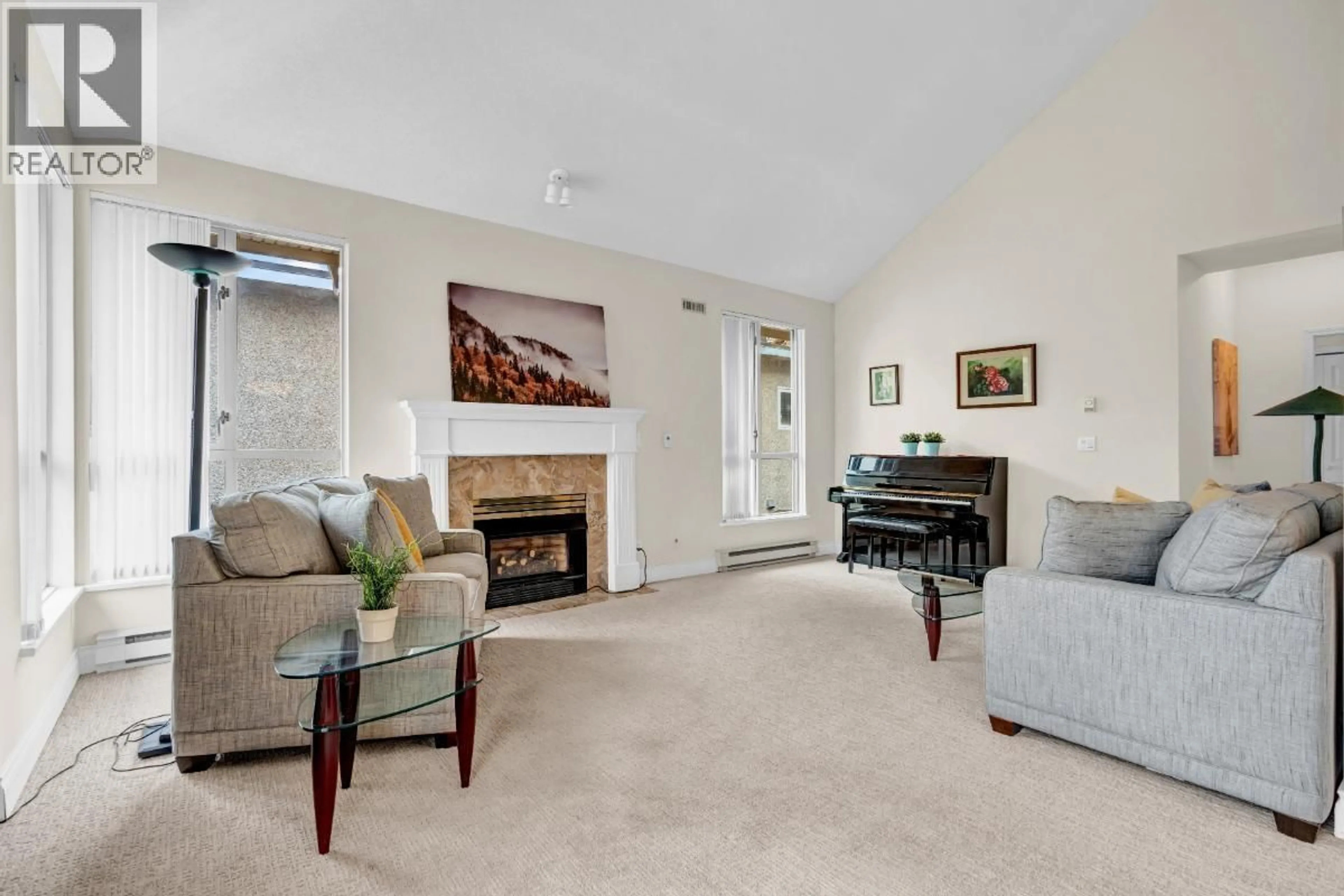 Living room with furniture, carpet floor for 309 - 3755 8TH AVENUE, Vancouver British Columbia V6R1Z2
