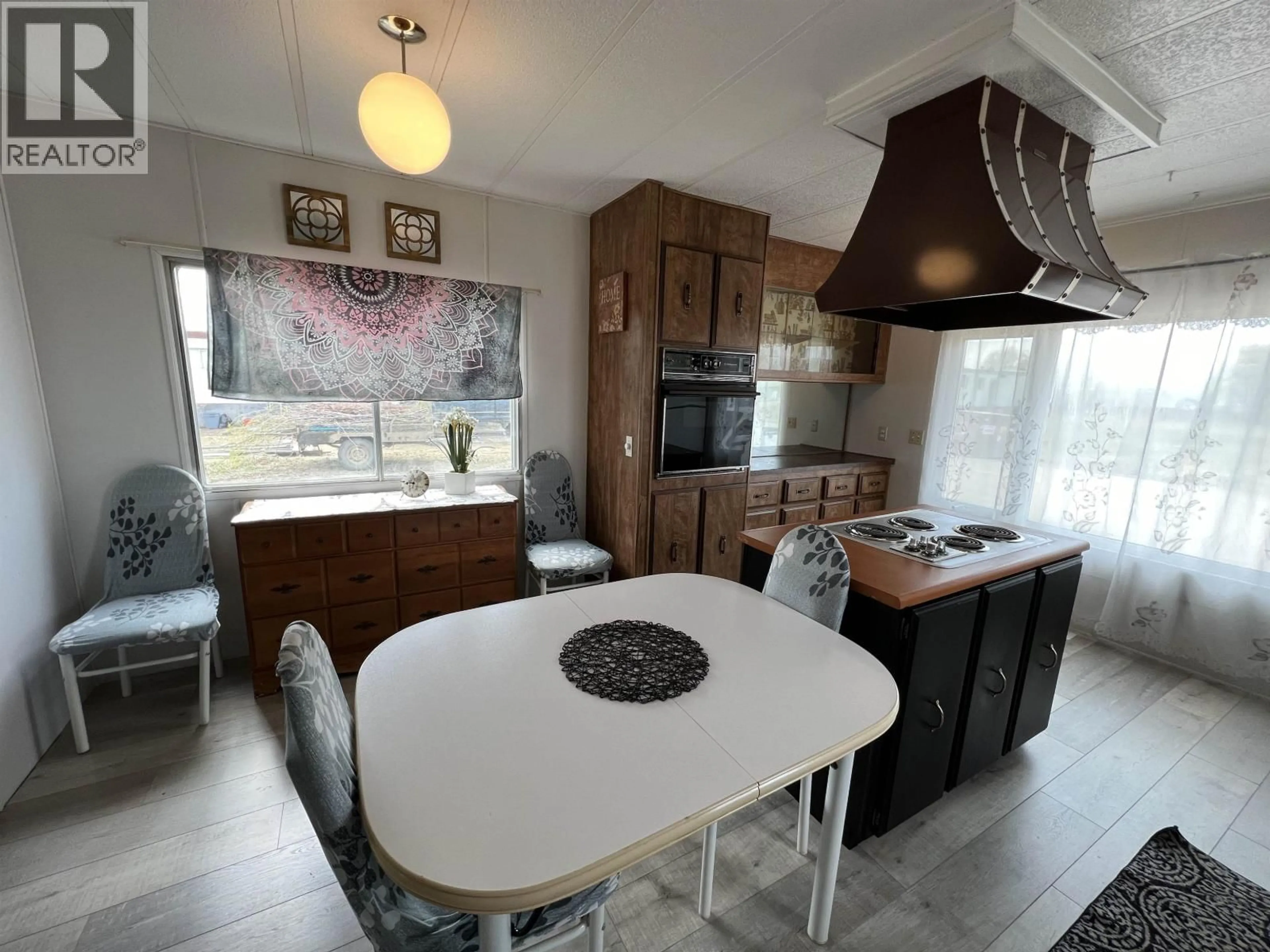 Open concept kitchen, ceramic/tile floor for 31 - 4501 NAHANNI DRIVE, Fort Nelson British Columbia V0C1R0