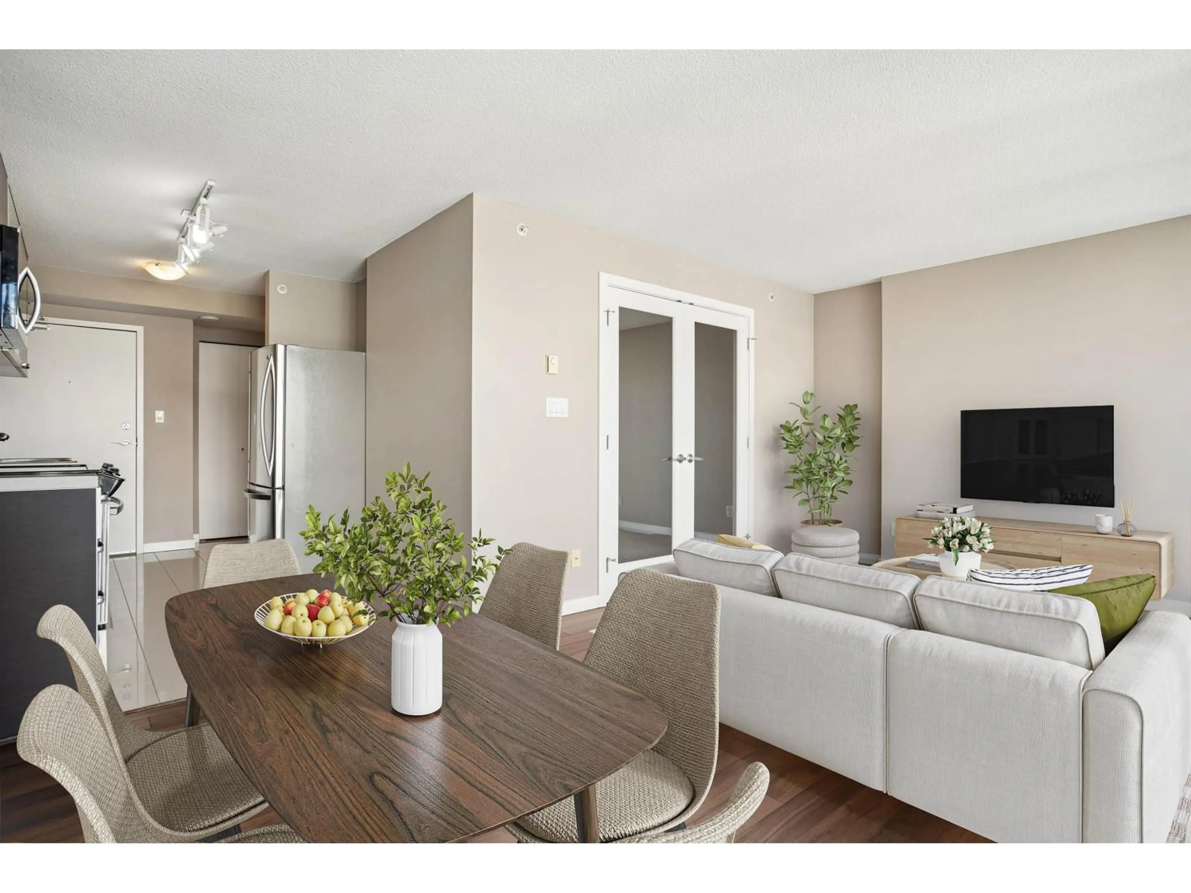 Living room with furniture, wood/laminate floor for 3601 - 9981 WHALLEY BOULEVARD, Surrey British Columbia V3T0G6