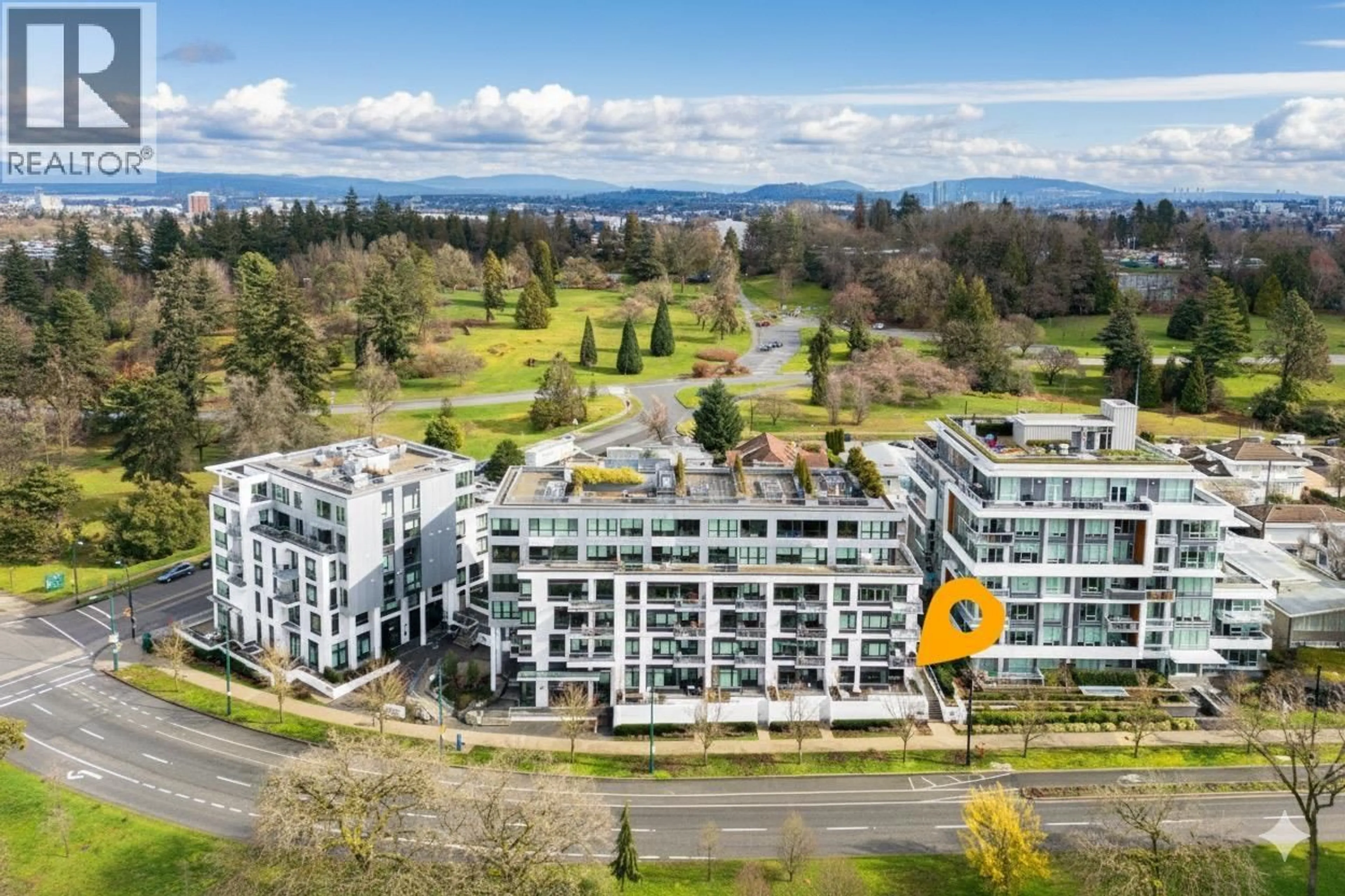 A pic from outside/outdoor area/front of a property/back of a property/a pic from drone, building for 104 - 4932 CAMBIE STREET, Vancouver British Columbia V5Z0K1