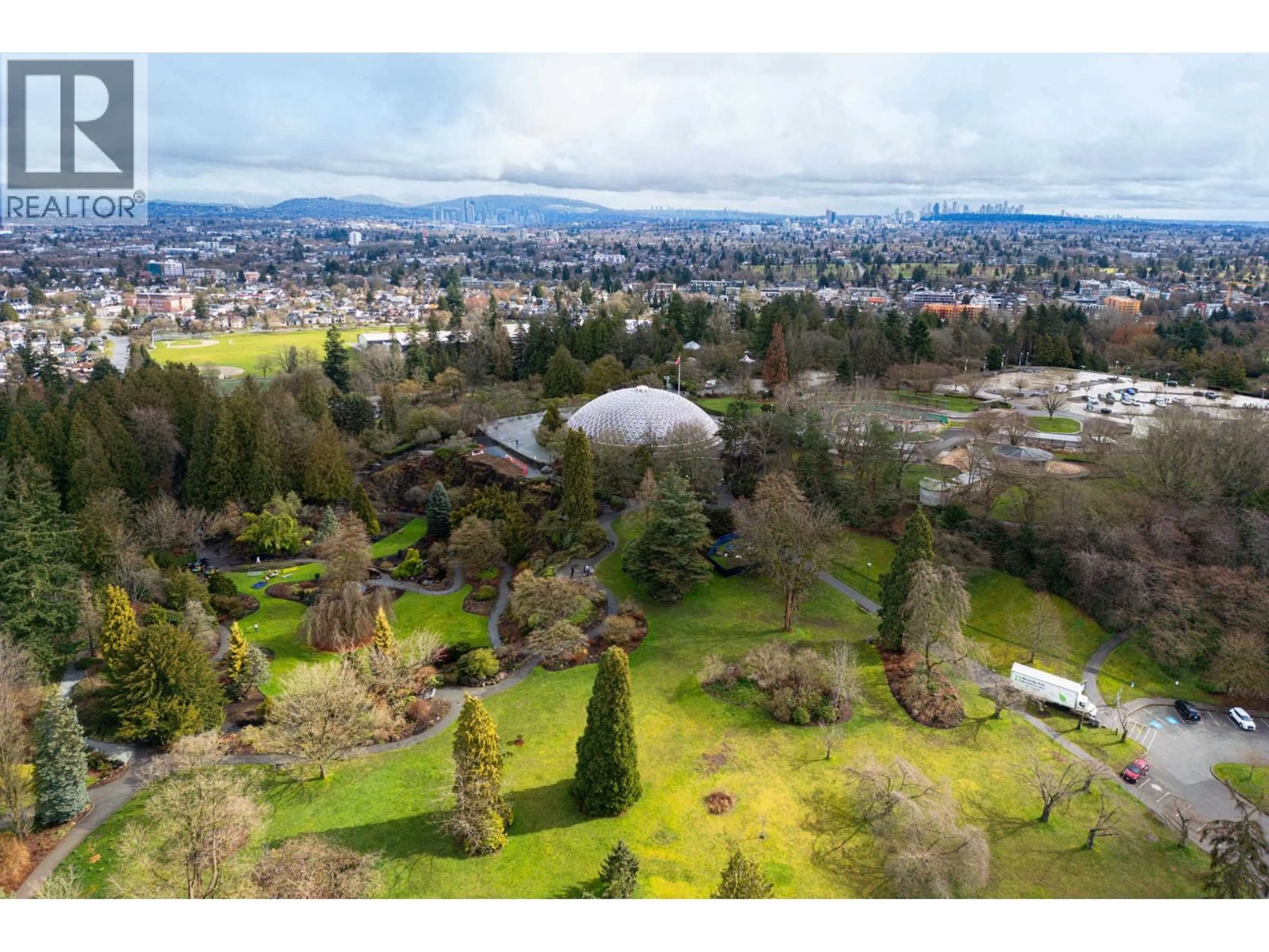 A pic from outside/outdoor area/front of a property/back of a property/a pic from drone, mountain view for 104 - 4932 CAMBIE STREET, Vancouver British Columbia V5Z0K1