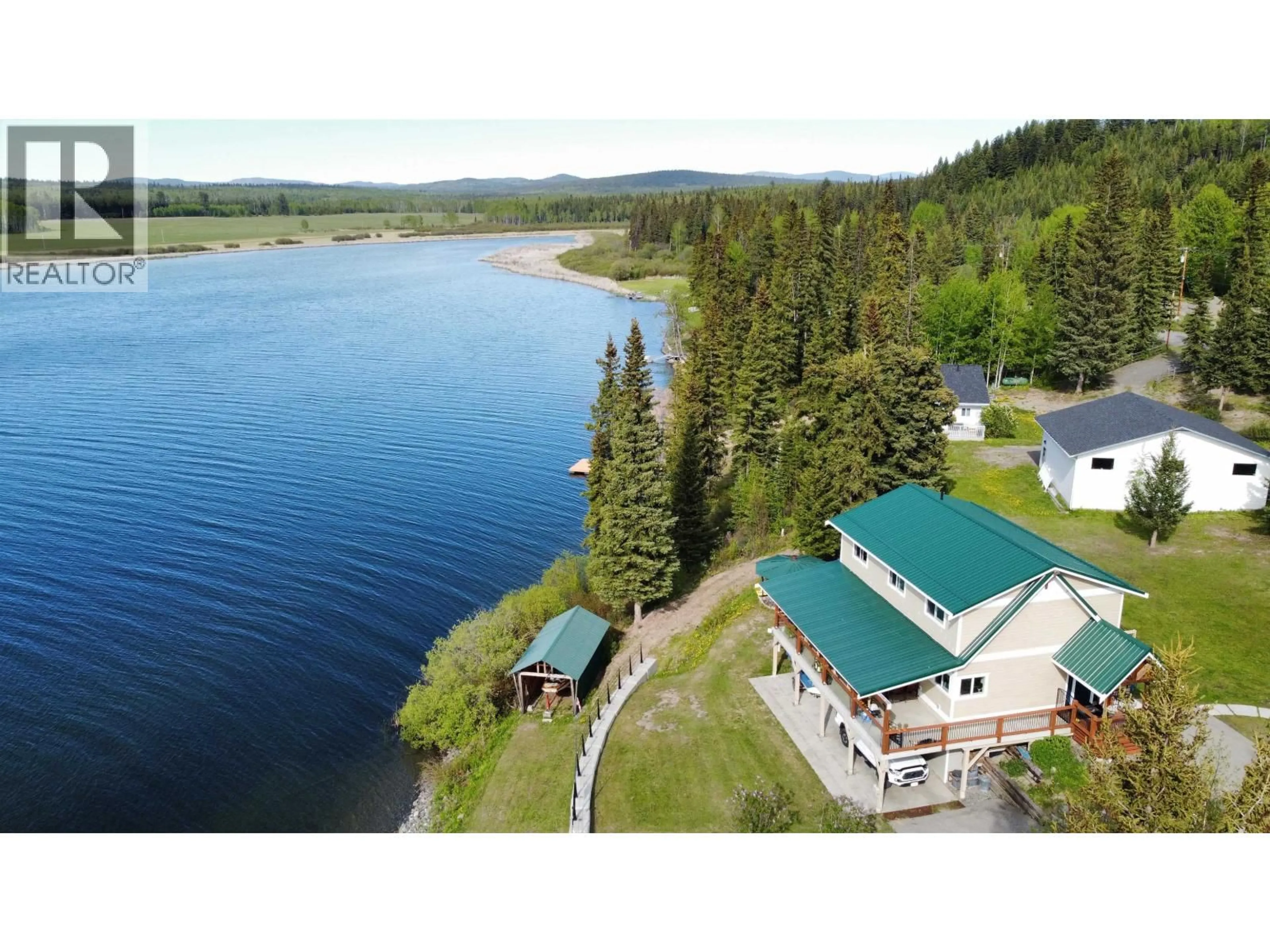 A pic from outside/outdoor area/front of a property/back of a property/a pic from drone, water/lake/river/ocean view for 6627 MCNOLTY ROAD, 100 Mile House British Columbia V0K1X3