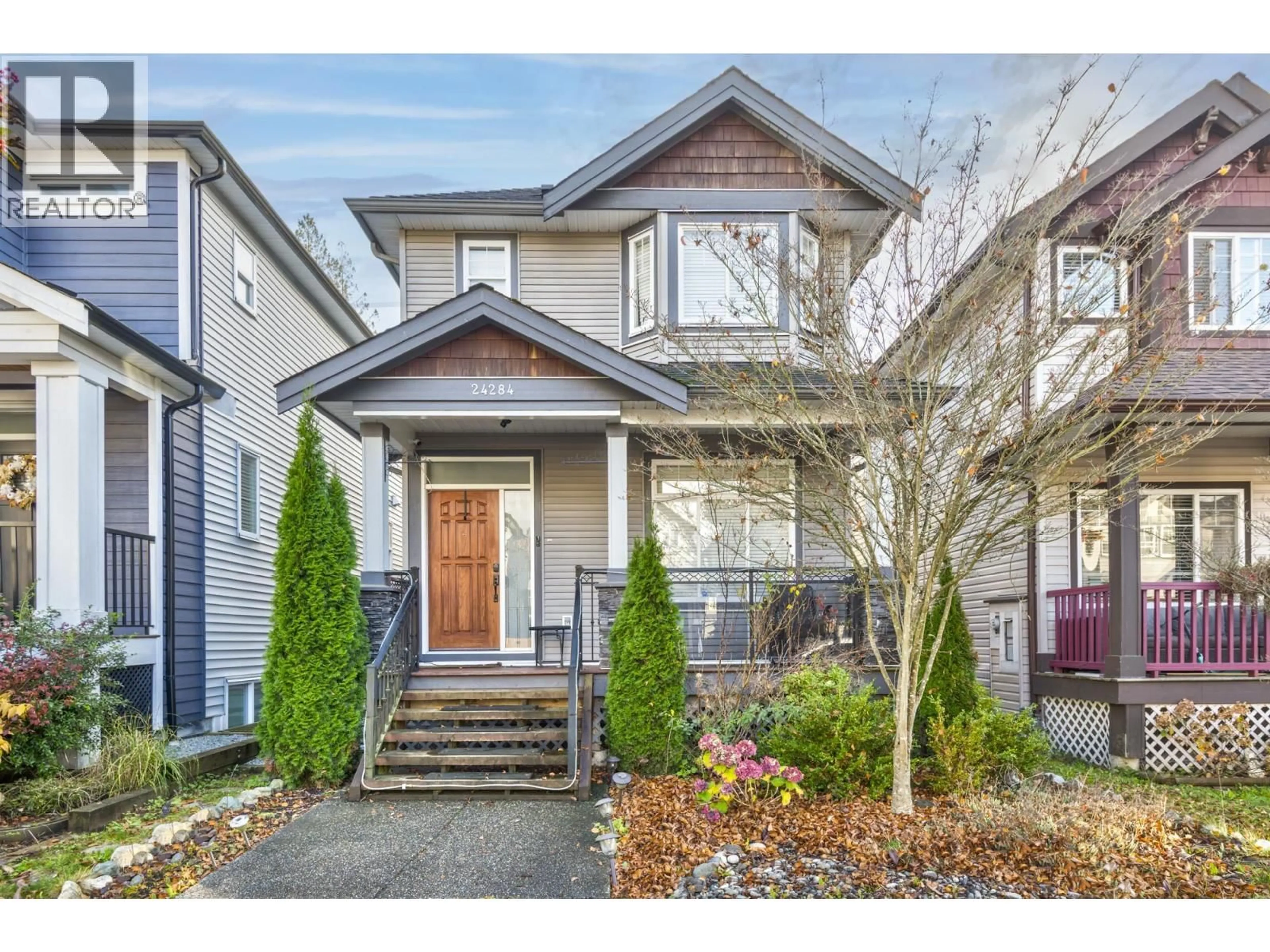 Home with vinyl exterior material, street for 24284 101A AVENUE, Maple Ridge British Columbia V2W0C2