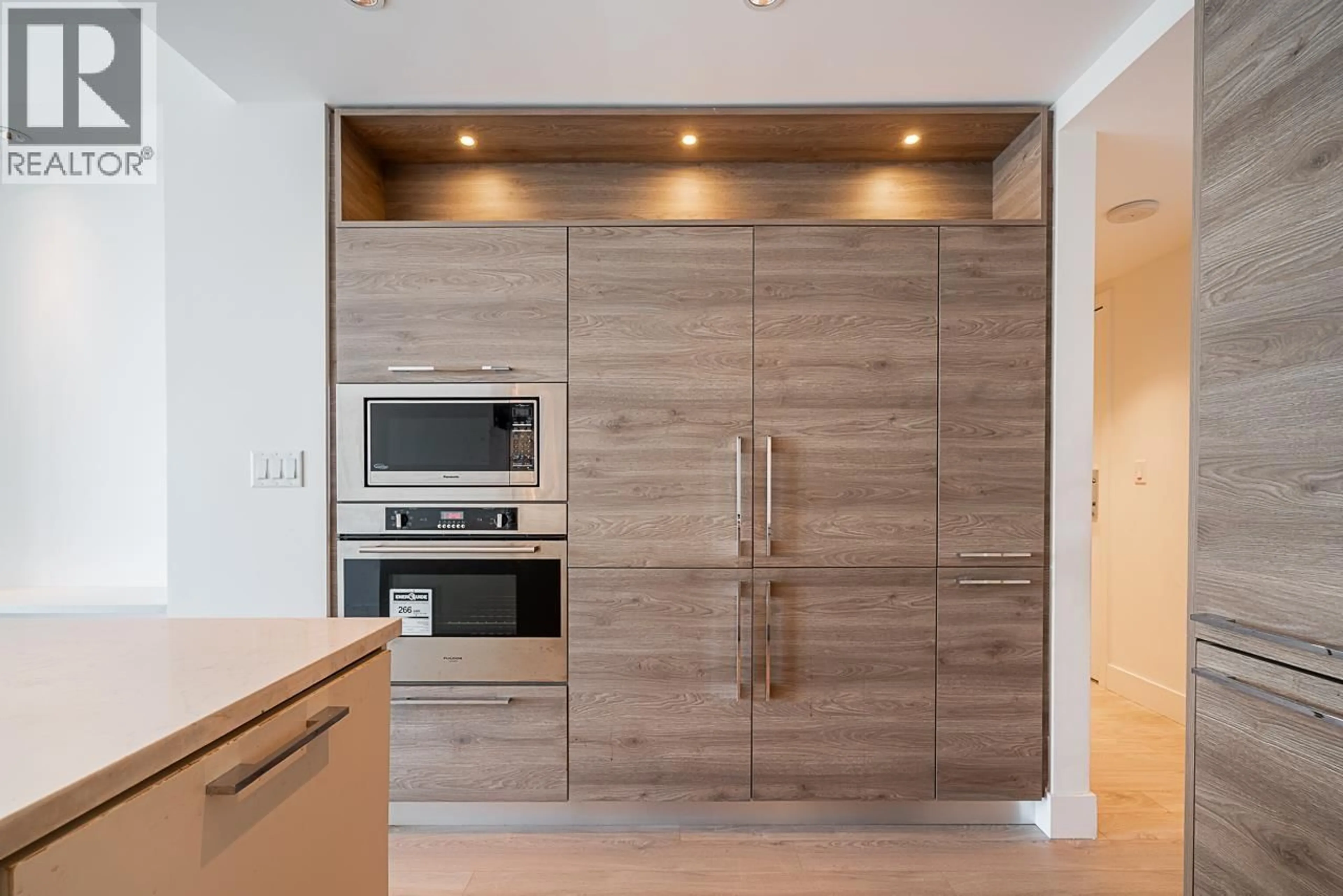 Contemporary kitchen, wood/laminate floor for 2401 - 7303 NOBLE LANE, Burnaby British Columbia V3N0H2