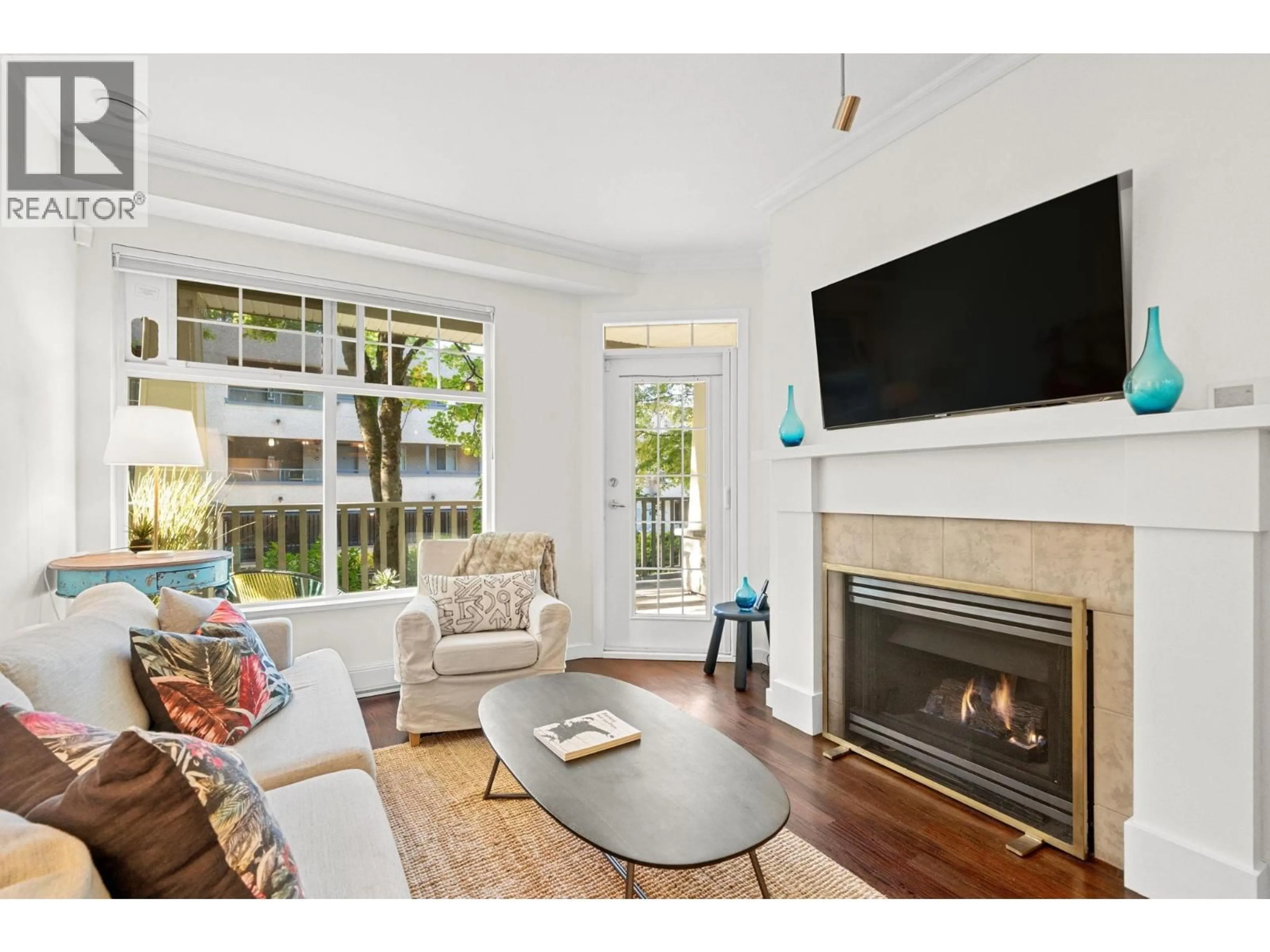 Living room with furniture, wood/laminate floor for 207 - 1388 NELSON STREET, Vancouver British Columbia V6E1J9