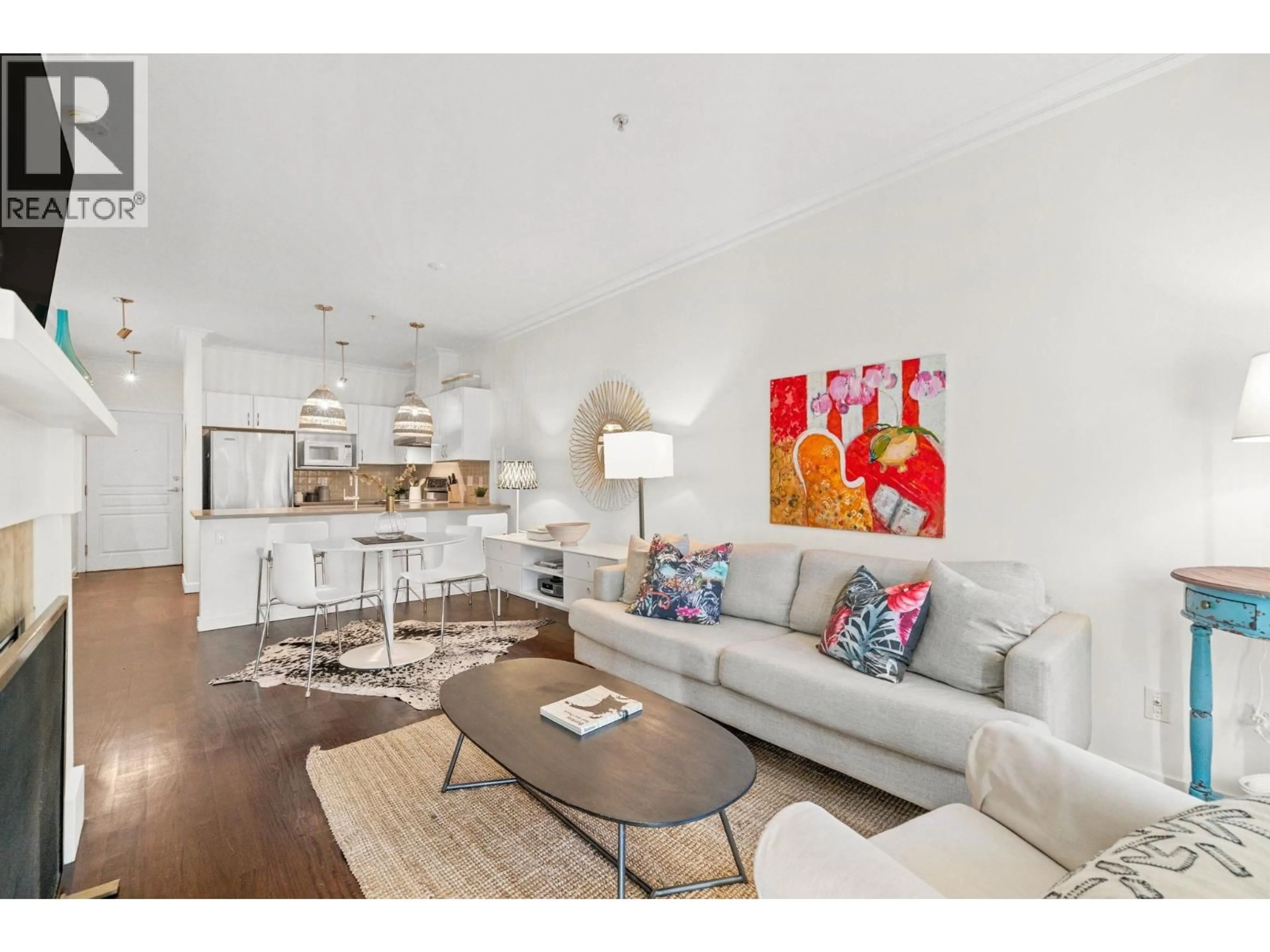 Living room with furniture, wood/laminate floor for 207 - 1388 NELSON STREET, Vancouver British Columbia V6E1J9