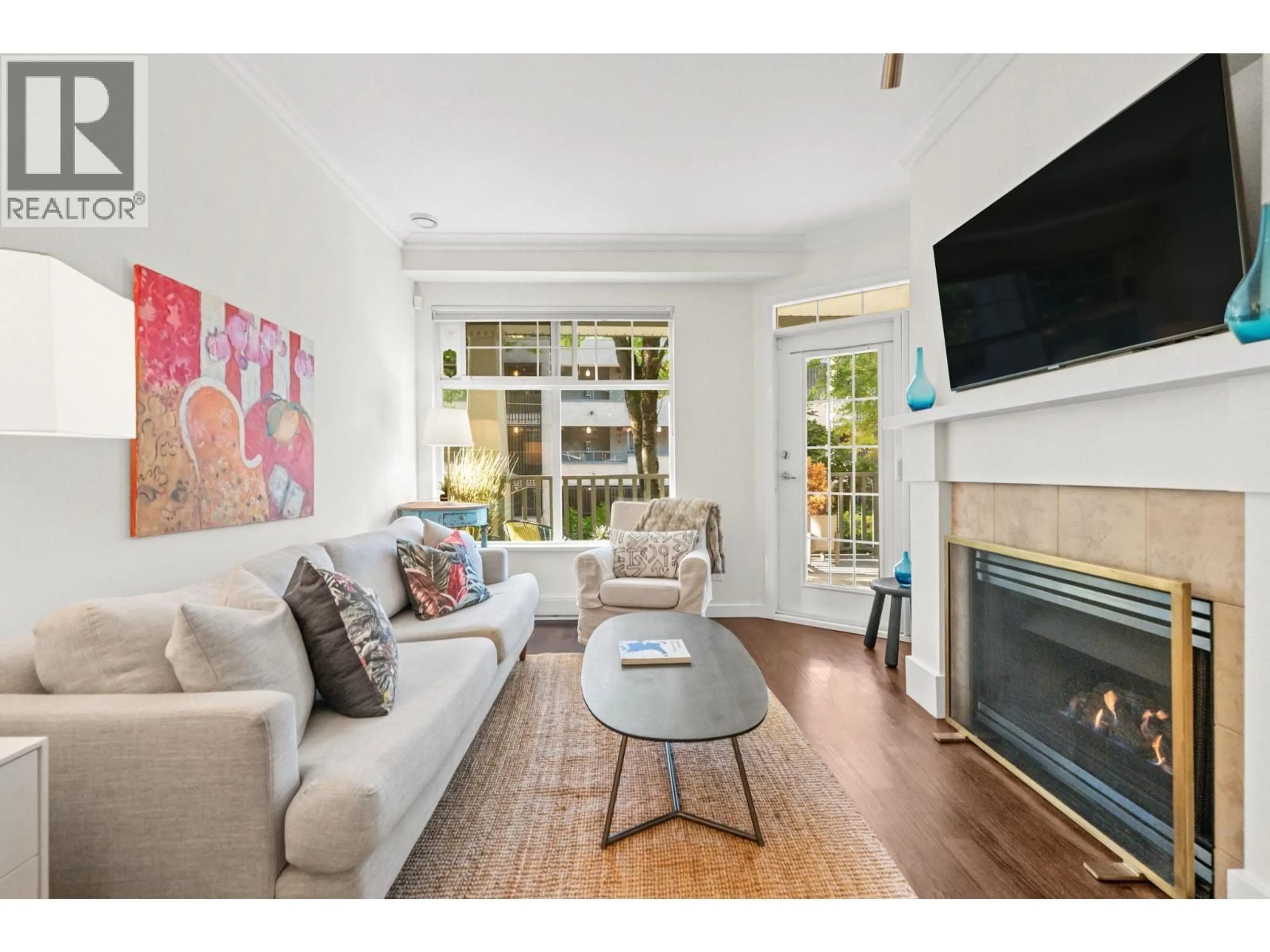 Living room with furniture, wood/laminate floor for 207 - 1388 NELSON STREET, Vancouver British Columbia V6E1J9