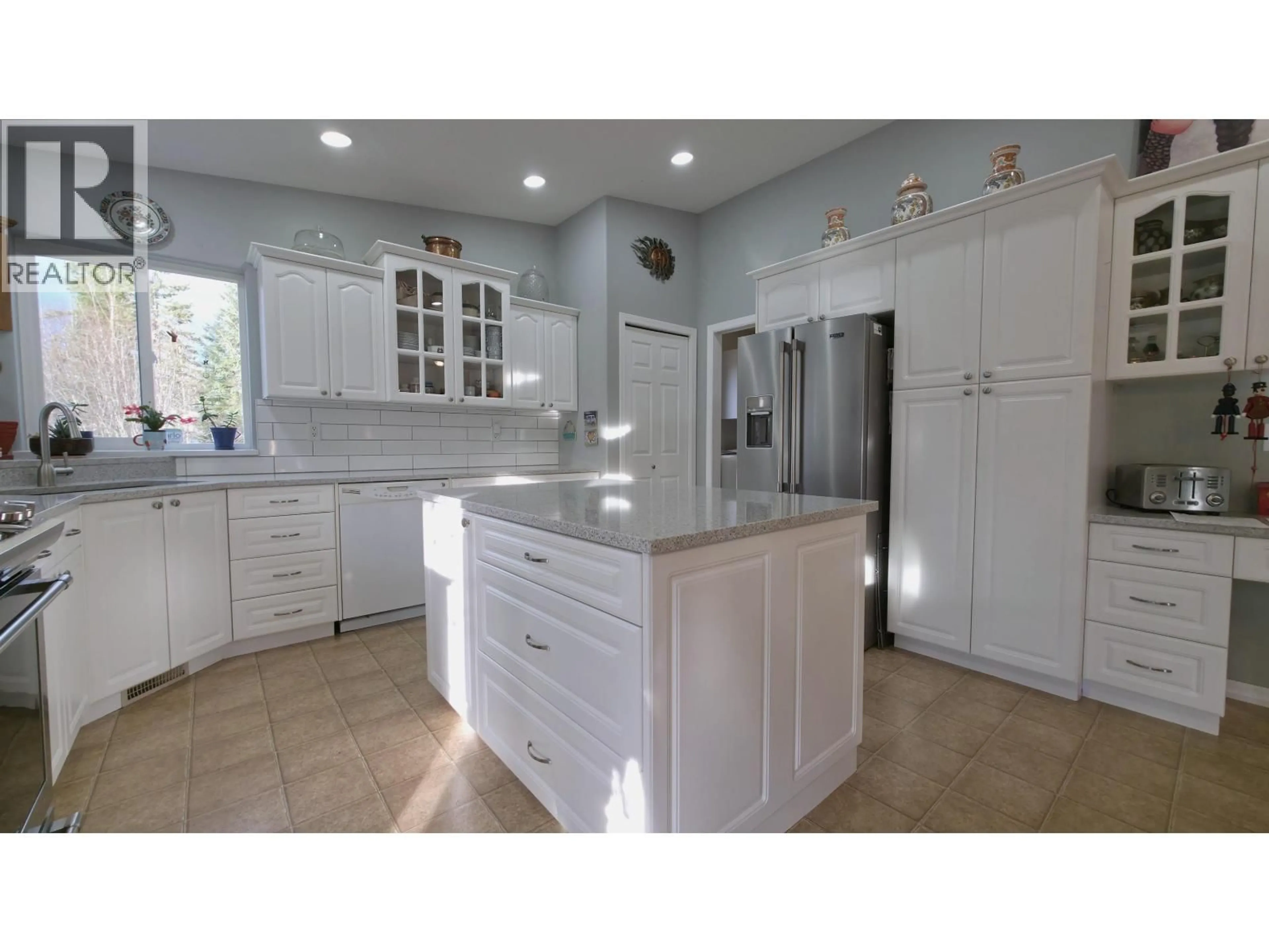 Open concept kitchen, ceramic/tile floor for 8125 SUNHILL ROAD, Prince George British Columbia V2N6E8