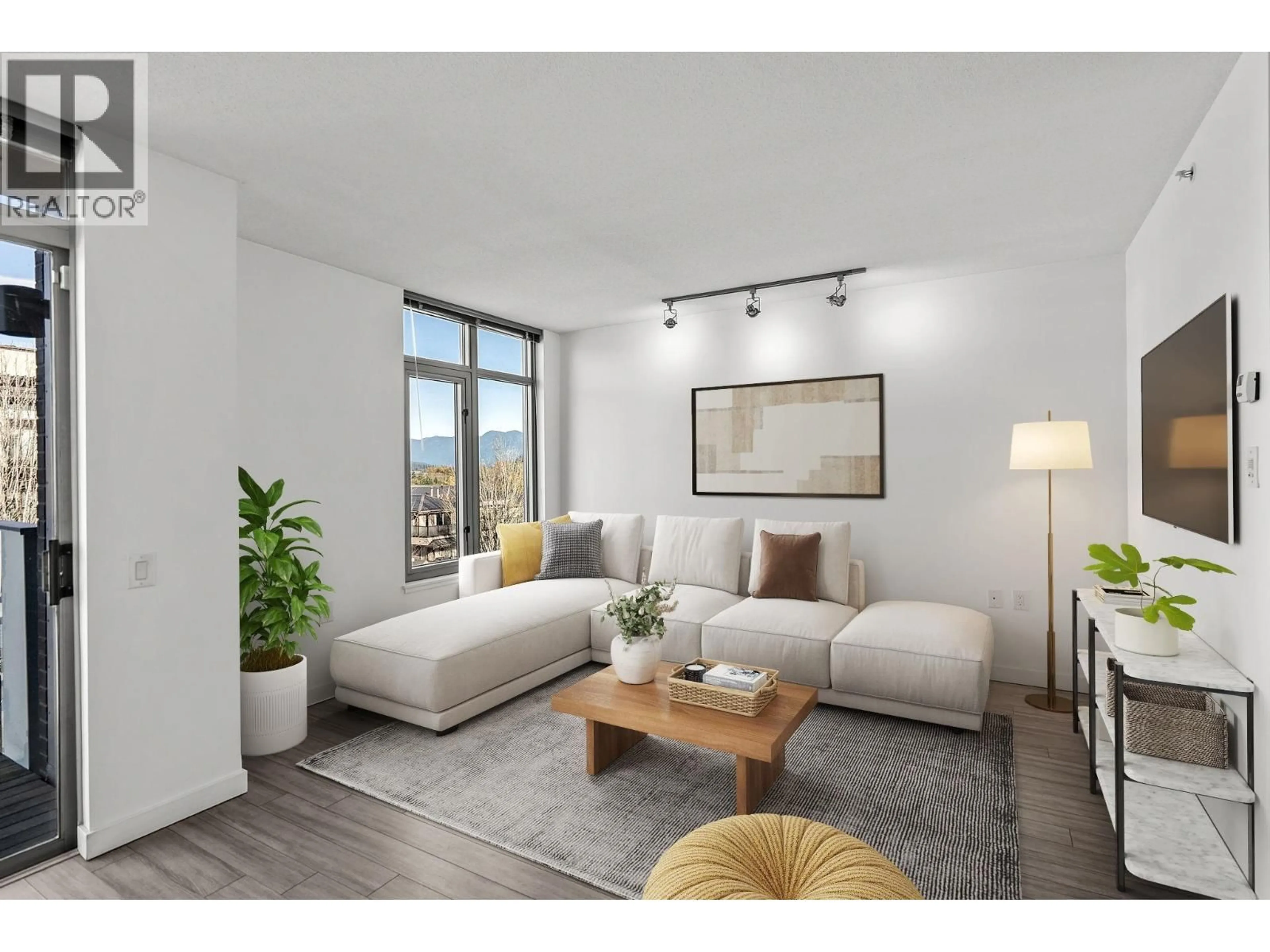 Living room with furniture, unknown for 410 - 4310 HASTINGS STREET, Burnaby British Columbia V5C2J9