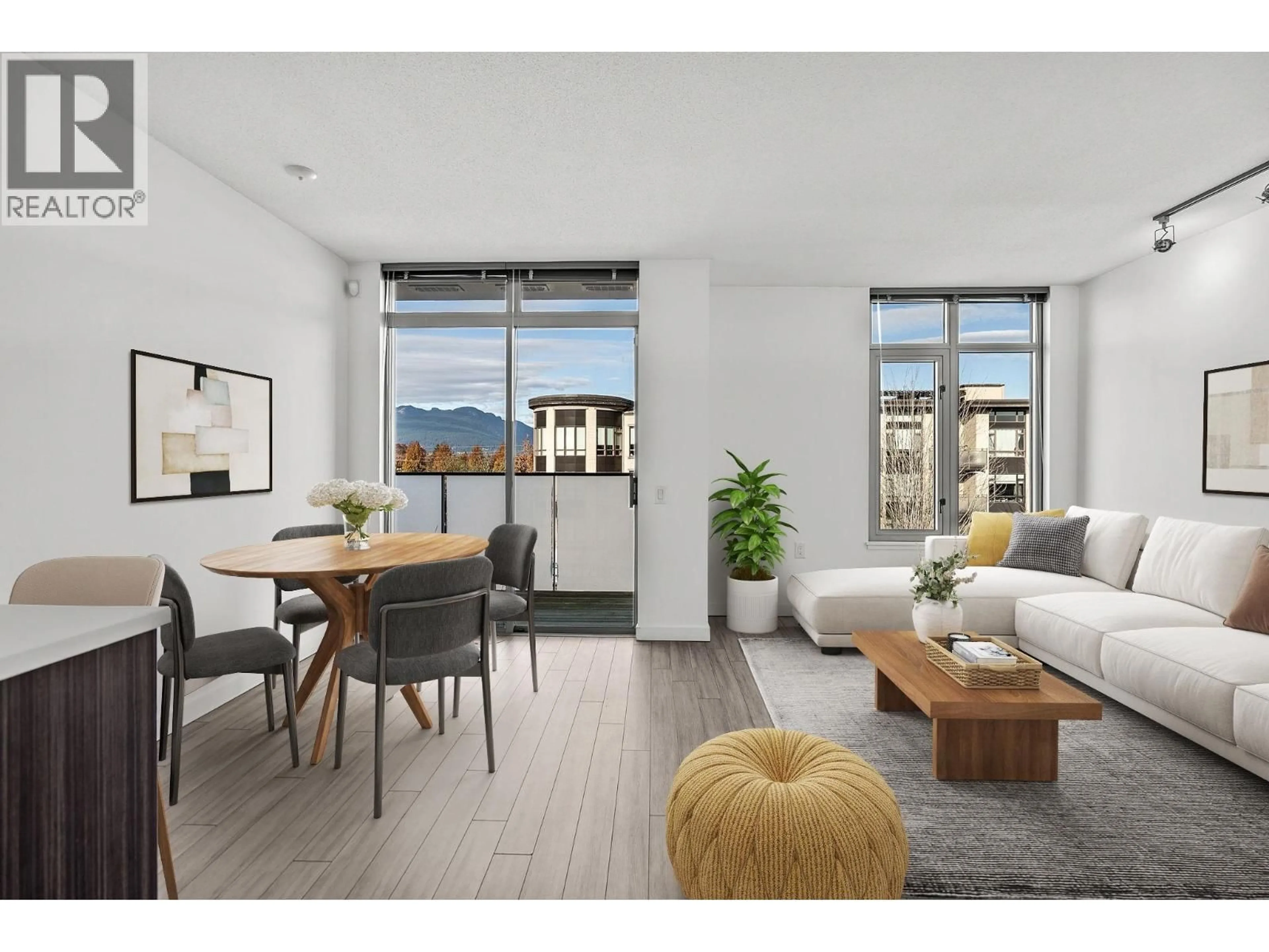 Living room with furniture, unknown for 410 - 4310 HASTINGS STREET, Burnaby British Columbia V5C2J9