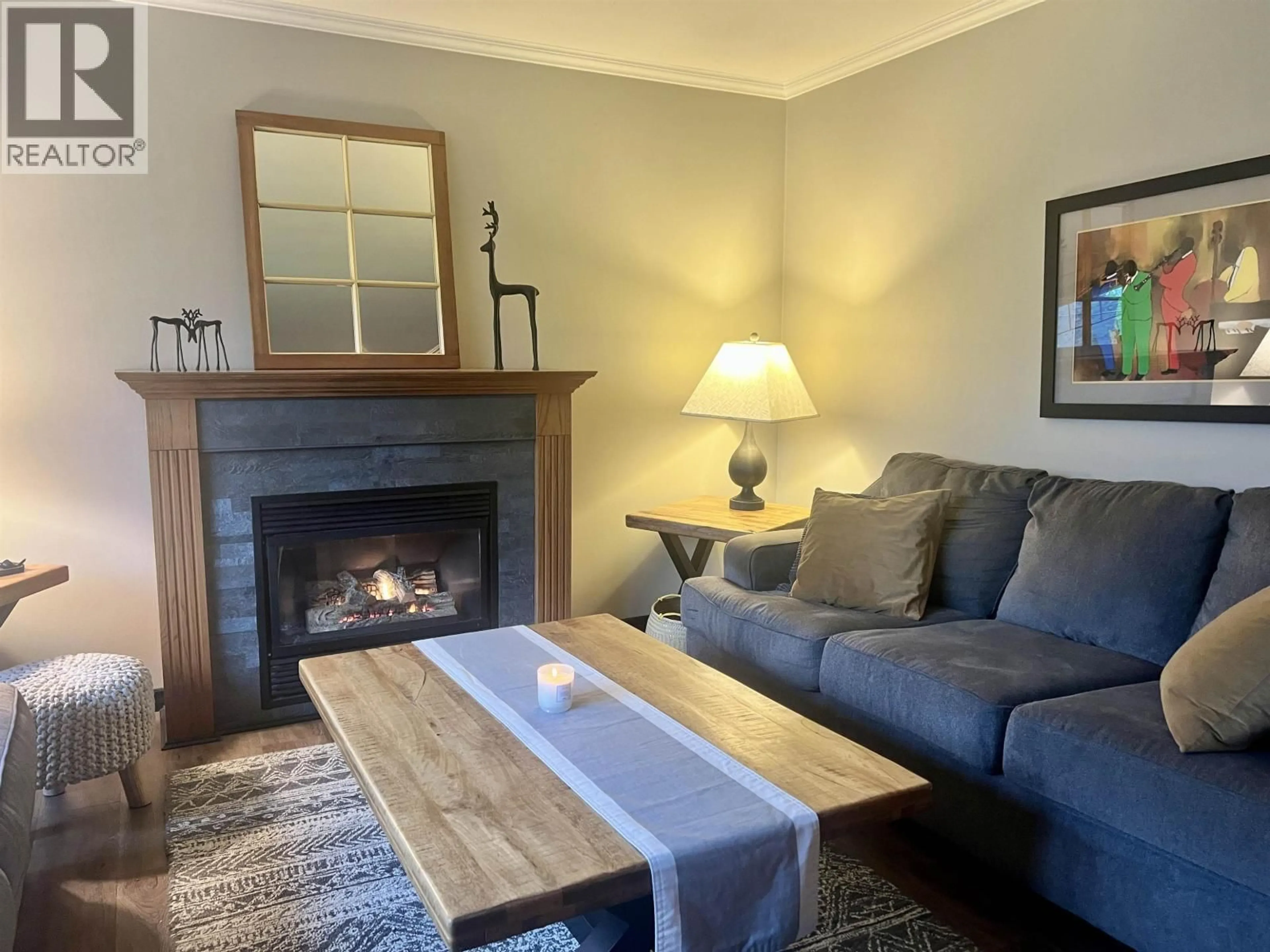 Living room with furniture, wood/laminate floor for 48 BABINE STREET, Kitimat British Columbia V8C1Y2