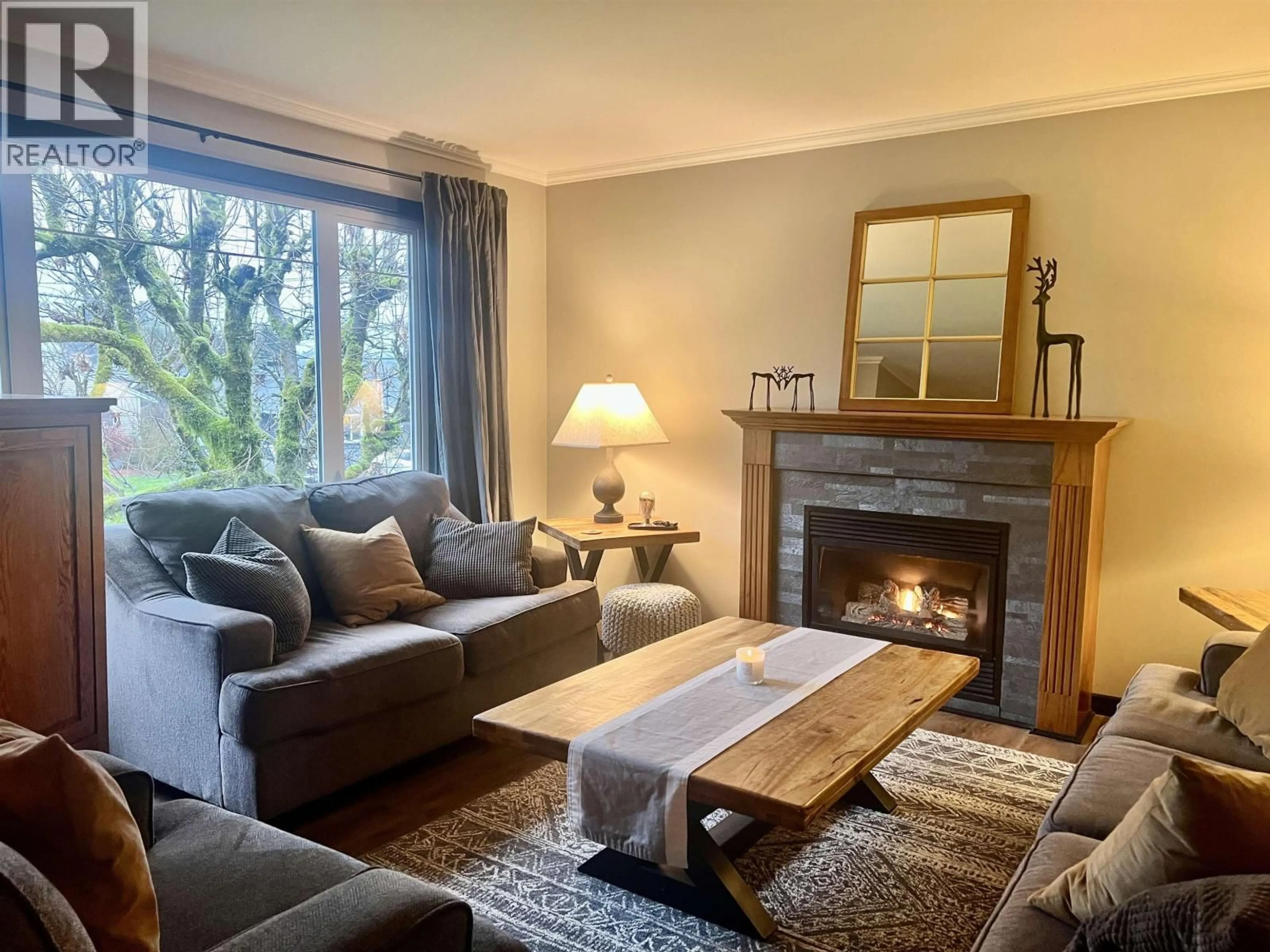 Living room with furniture, wood/laminate floor for 48 BABINE STREET, Kitimat British Columbia V8C1Y2
