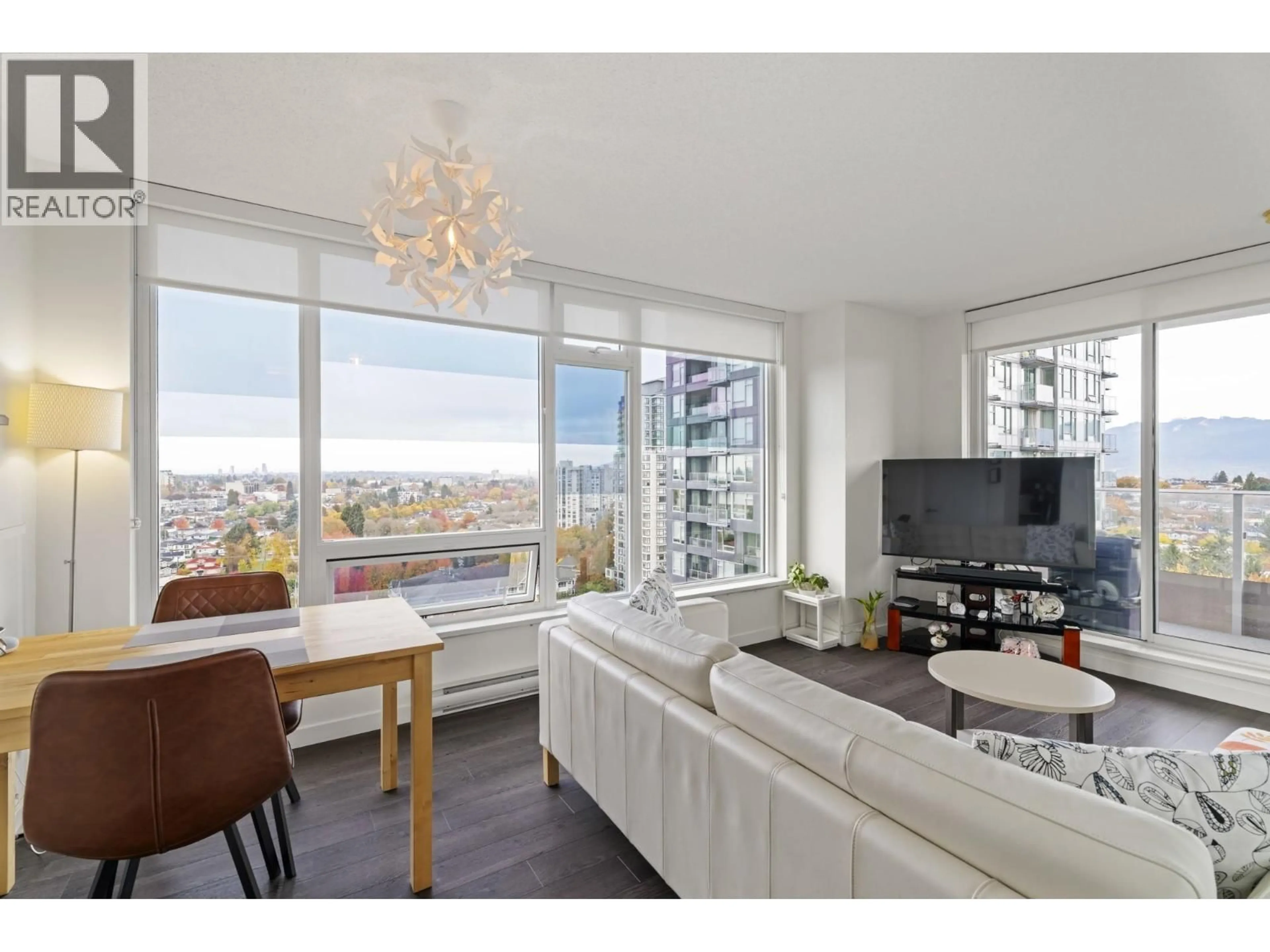 Living room with furniture, wood/laminate floor for 1602 - 5515 BOUNDARY ROAD, Vancouver British Columbia V5R0E3