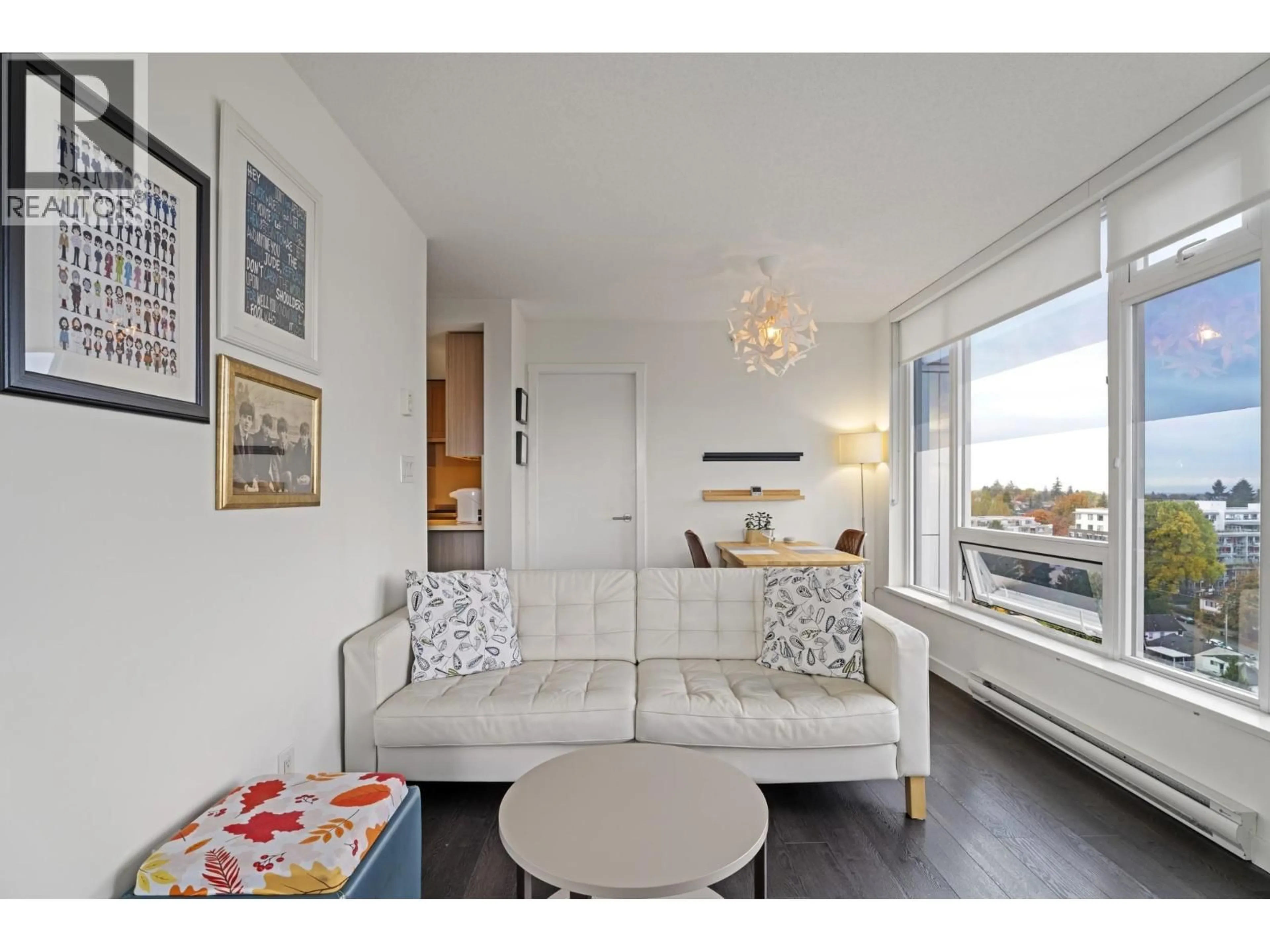 Living room with furniture, wood/laminate floor for 1602 - 5515 BOUNDARY ROAD, Vancouver British Columbia V5R0E3