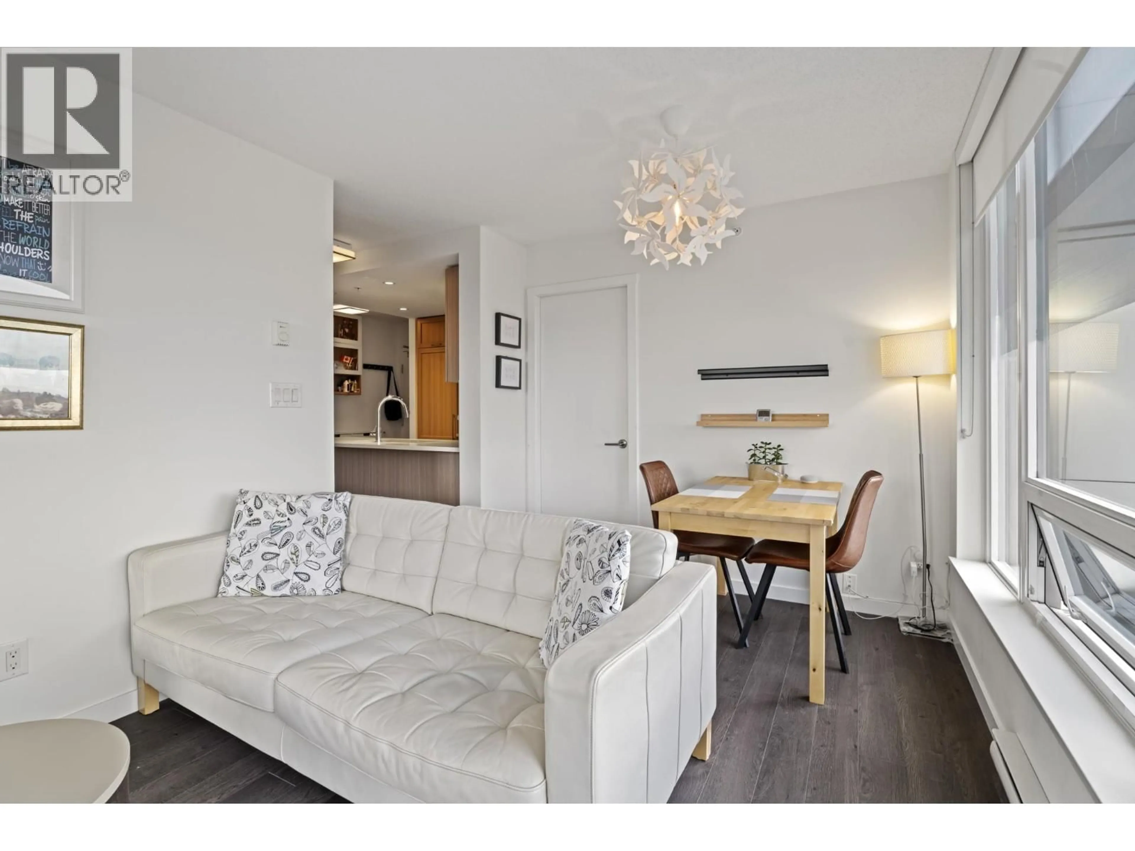 Living room with furniture, wood/laminate floor for 1602 - 5515 BOUNDARY ROAD, Vancouver British Columbia V5R0E3