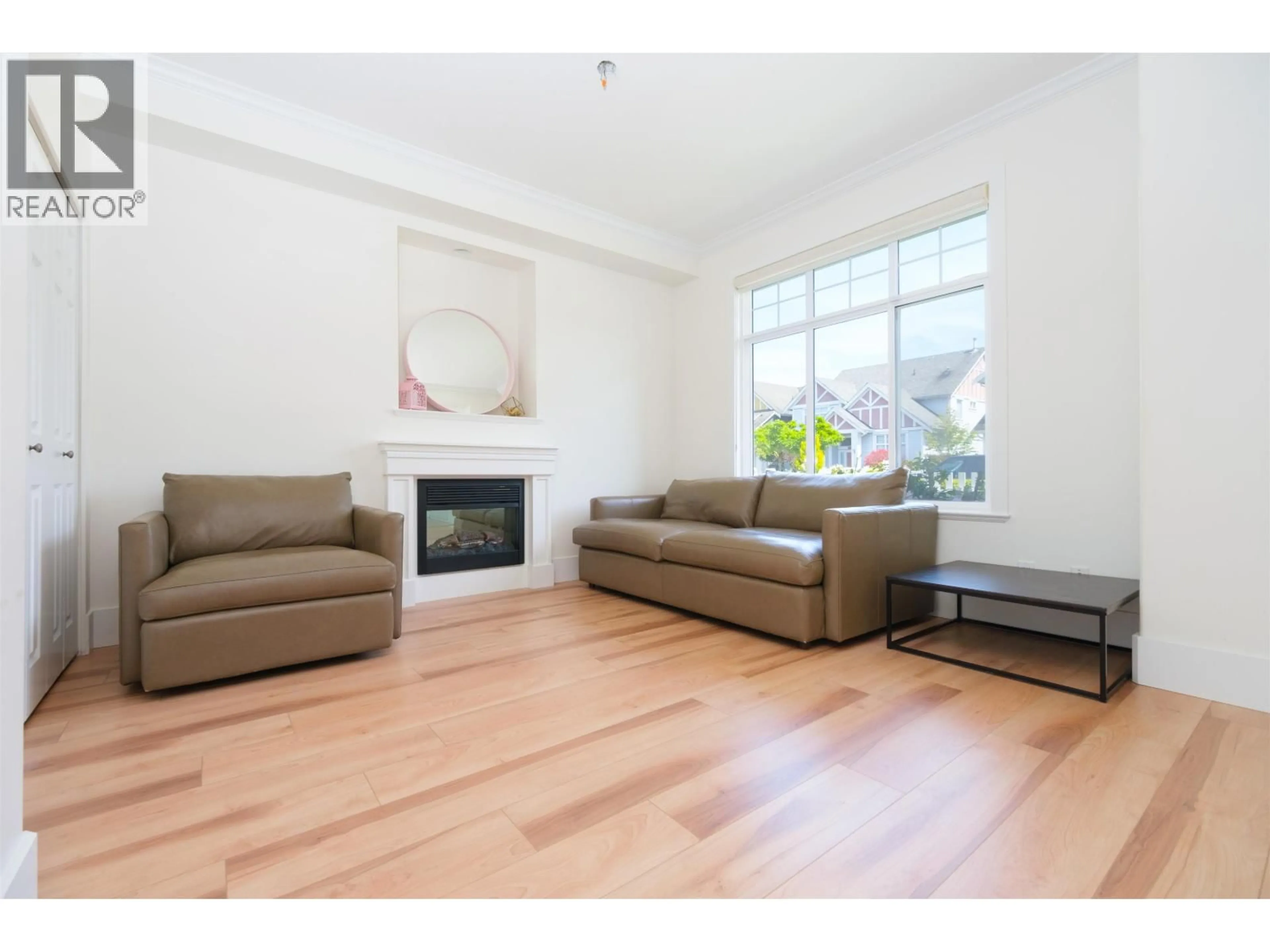 Living room with furniture, wood/laminate floor for 12293 EWEN AVENUE, Richmond British Columbia V7E6S8