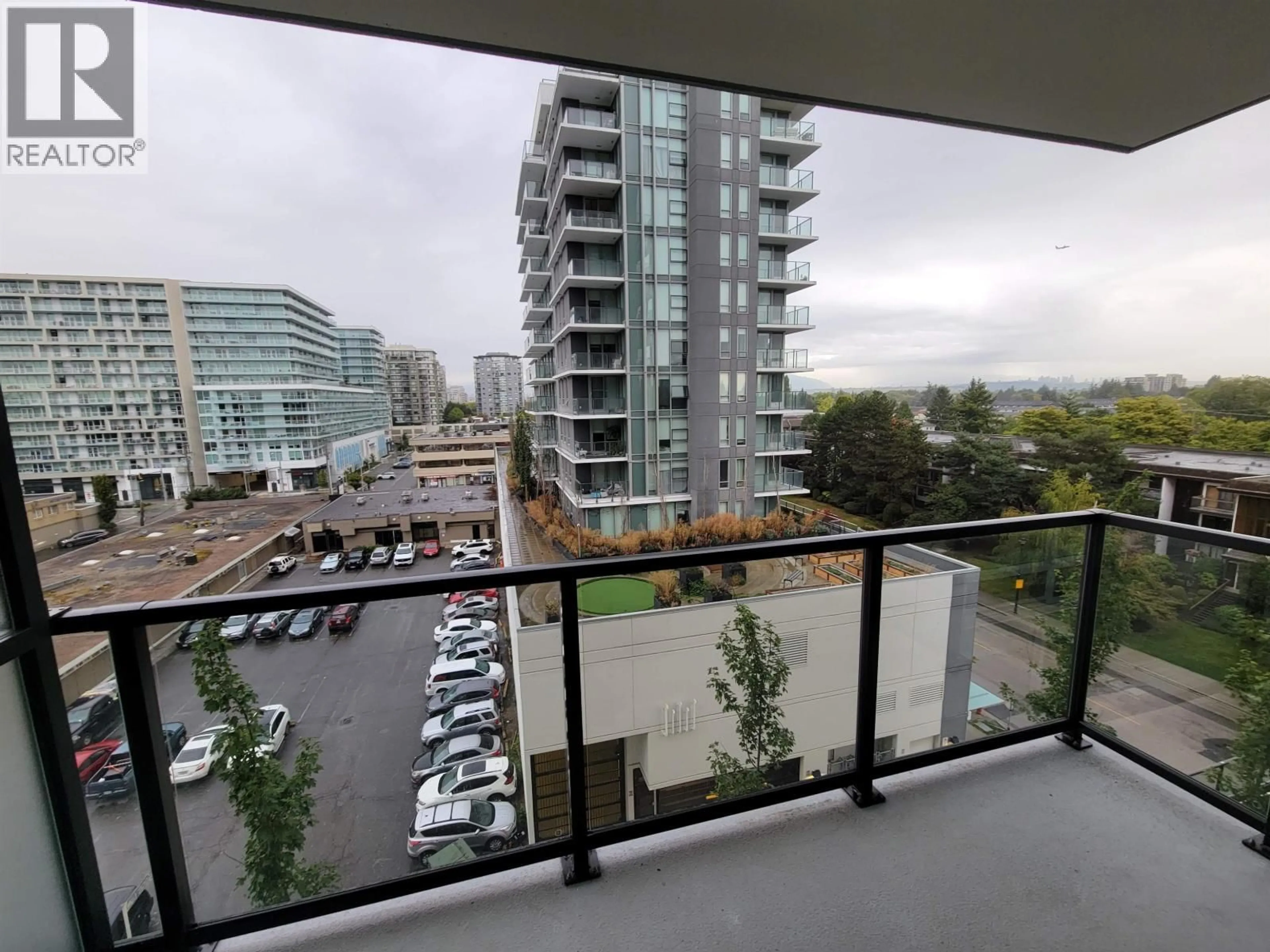 Balcony in the apartment, city buildings view from balcony for 709 - 6633 BUSWELL STREET, Richmond British Columbia V6Y0M3