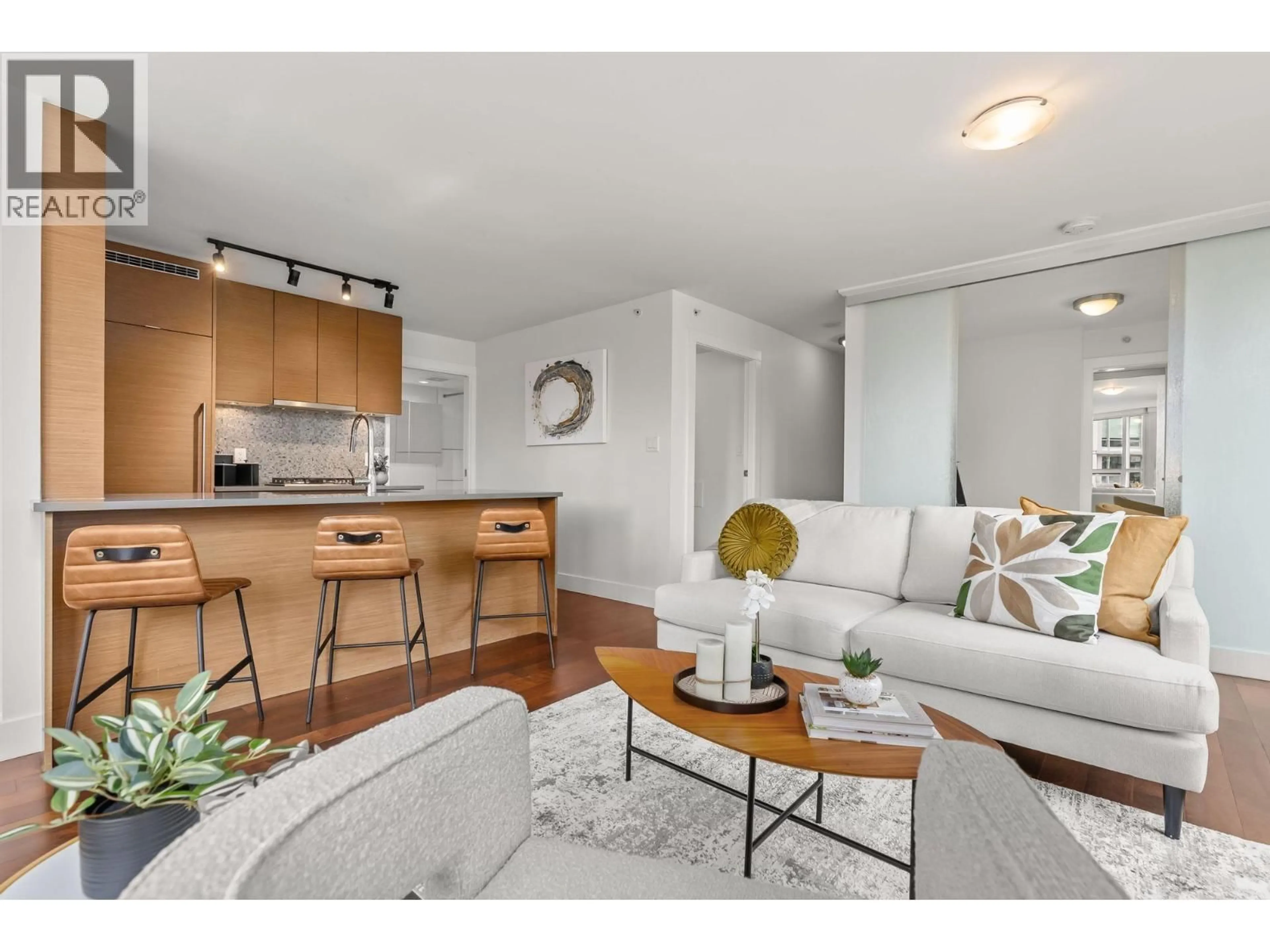 Living room with furniture, wood/laminate floor for 907 - 565 SMITHE STREET, Vancouver British Columbia V6B0E4