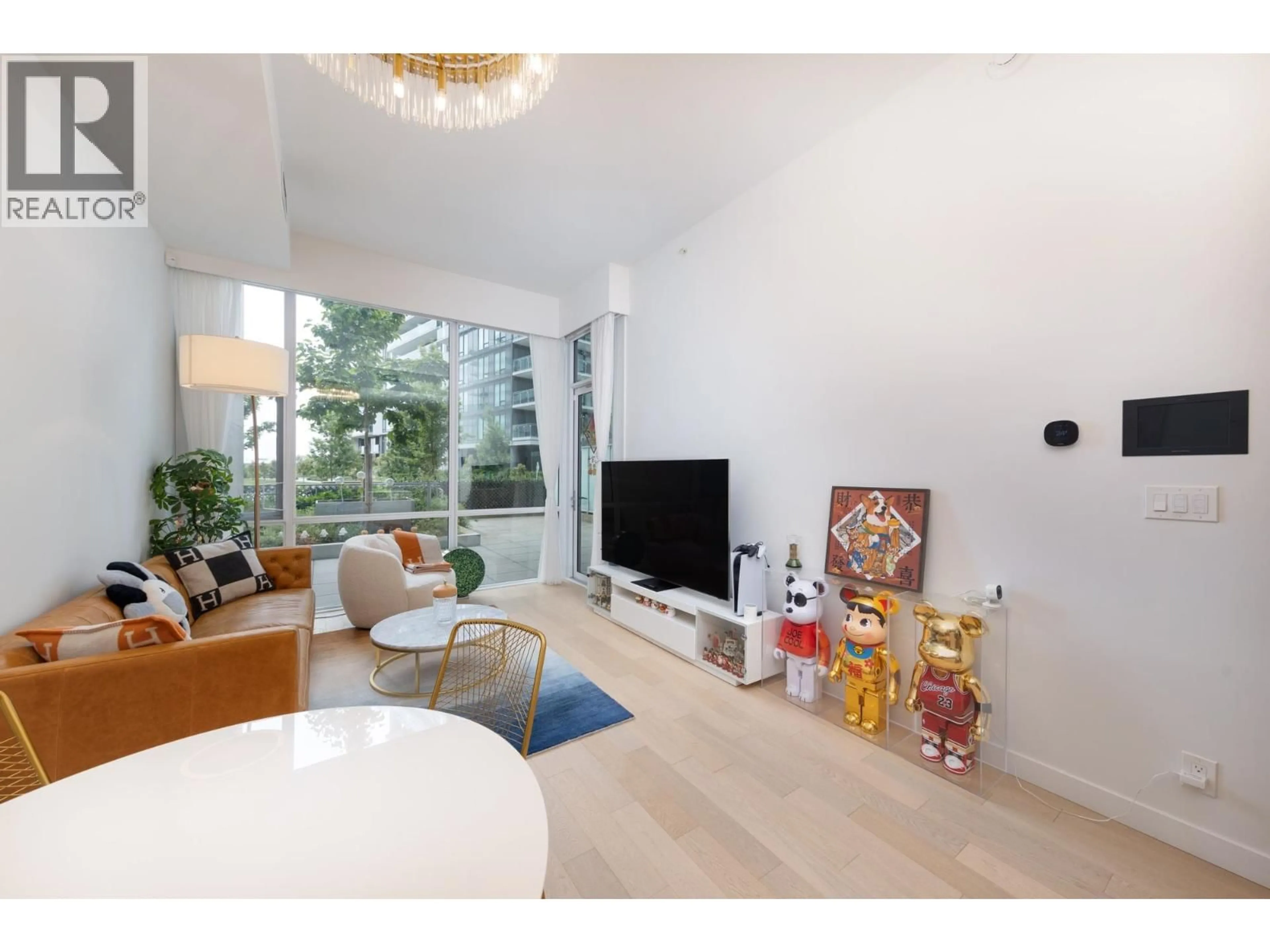 Living room with furniture, unknown for 107 - 6688 PEARSON WAY, Richmond British Columbia V7C0E5