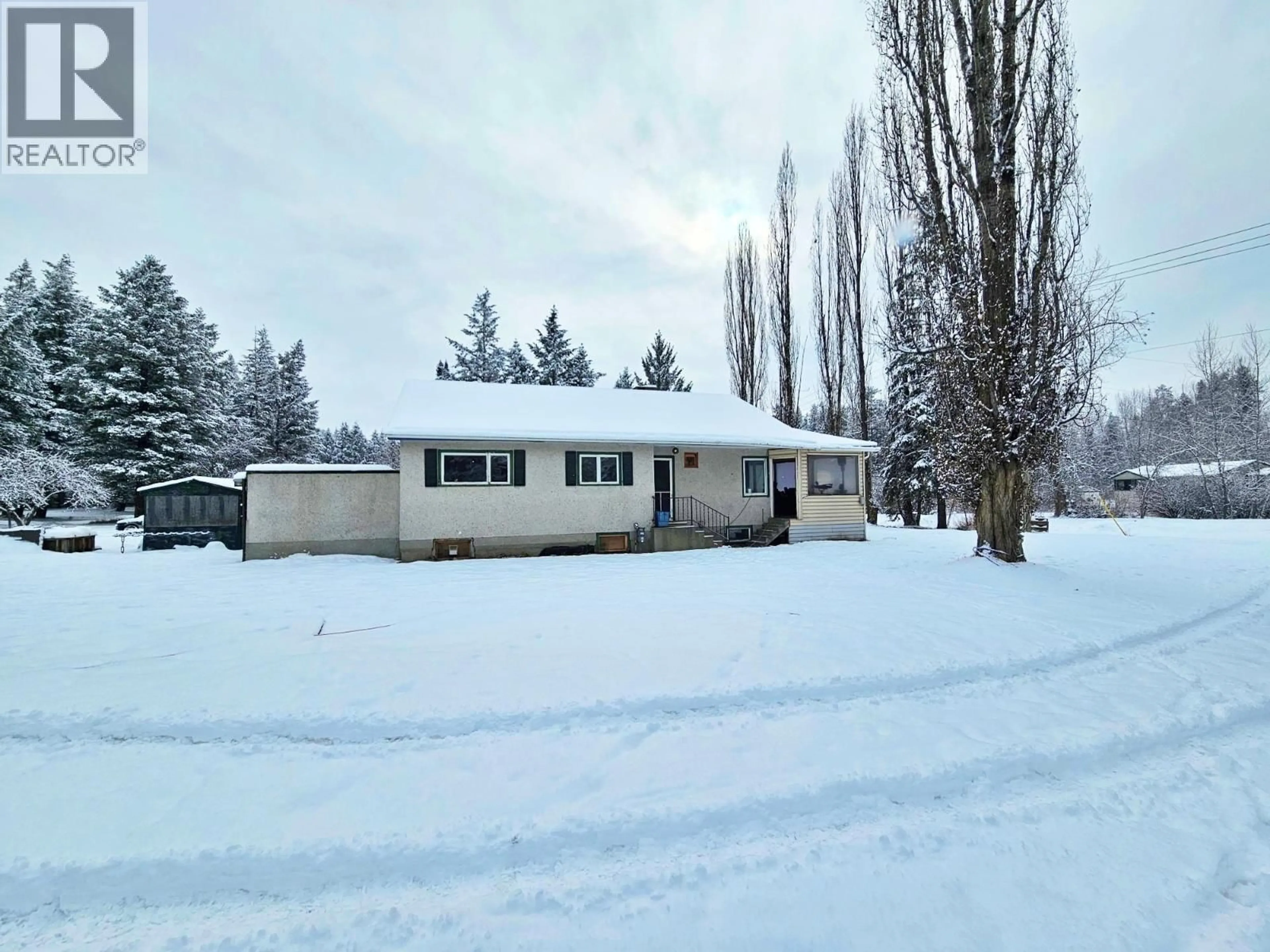 A pic from outside/outdoor area/front of a property/back of a property/a pic from drone, street for 1108 RIVER PARK ROAD, Quesnel British Columbia V2J2Y9