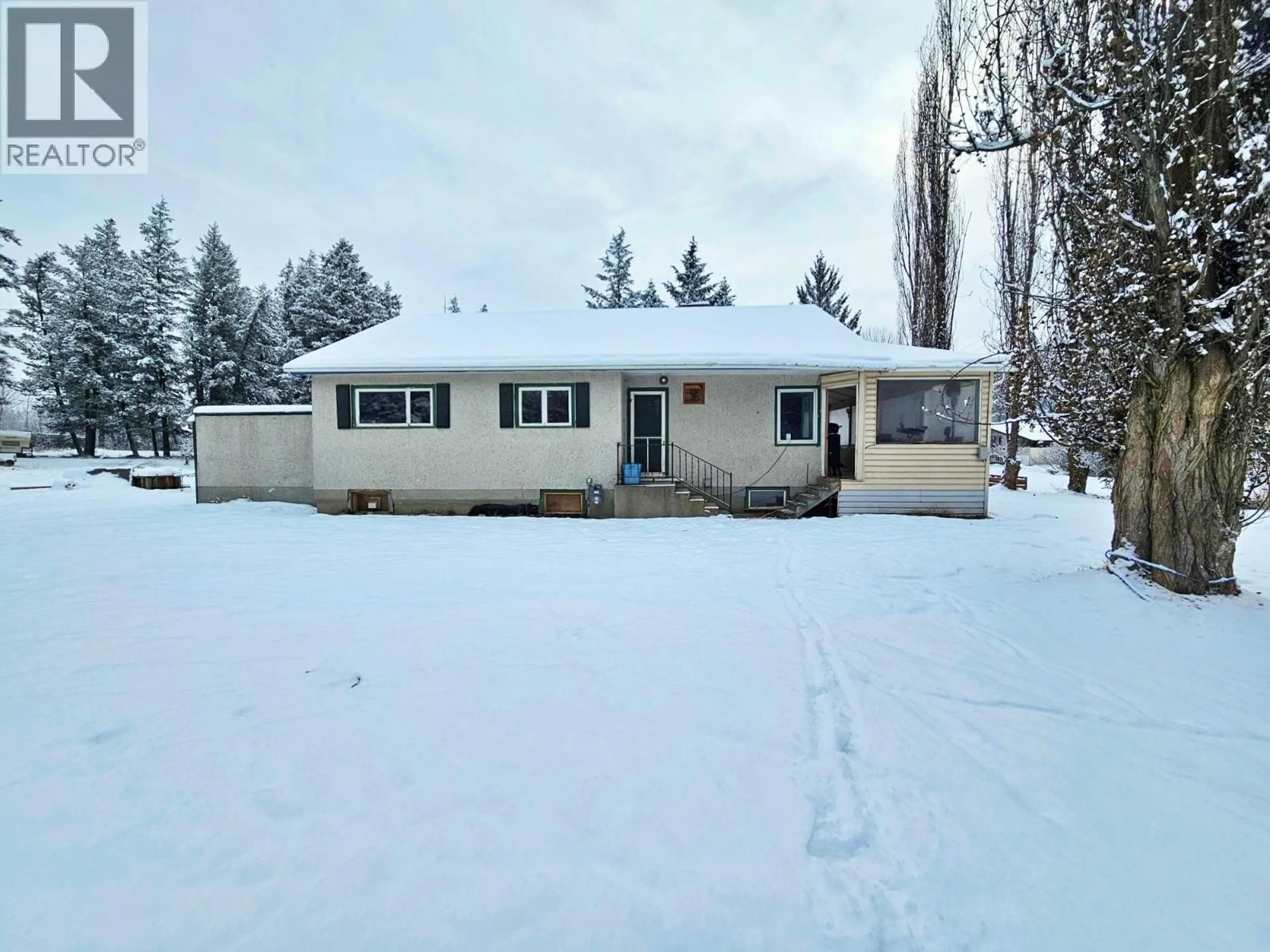 A pic from outside/outdoor area/front of a property/back of a property/a pic from drone, street for 1108 RIVER PARK ROAD, Quesnel British Columbia V2J2Y9