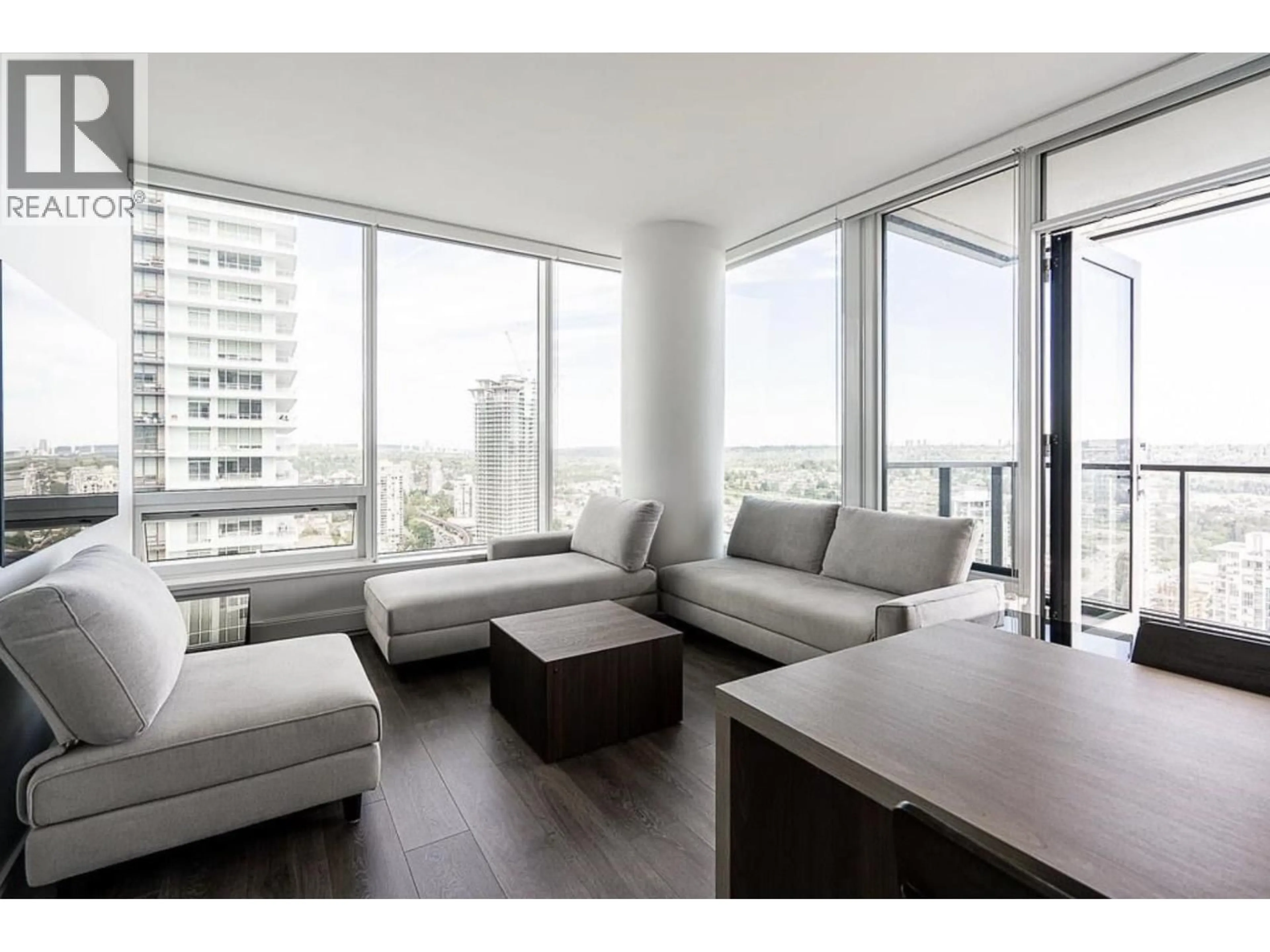 Living room with furniture, wood/laminate floor for 3102 - 1955 ALPHA WAY, Burnaby British Columbia V5C0K6