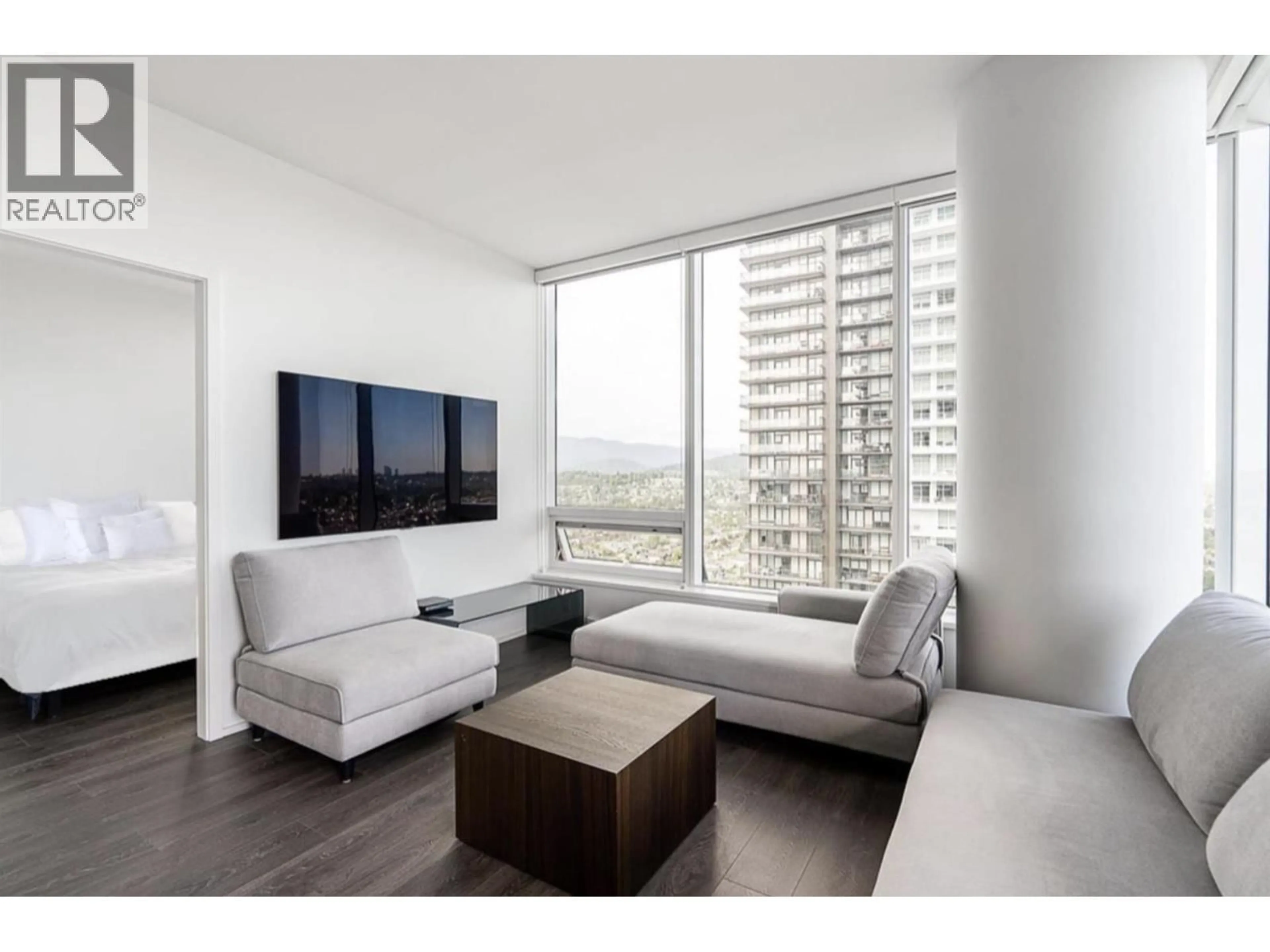 Living room with furniture, wood/laminate floor for 3102 - 1955 ALPHA WAY, Burnaby British Columbia V5C0K6