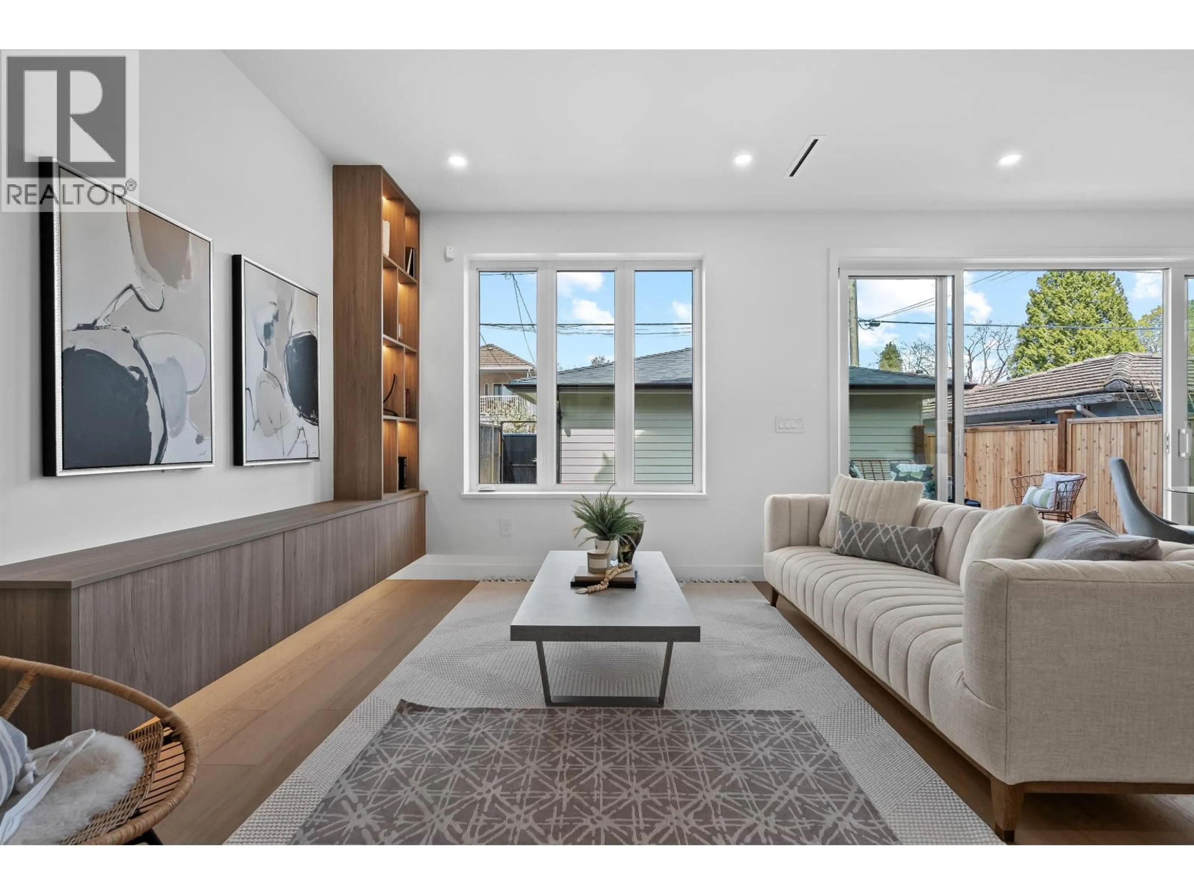 Living room with furniture, wood/laminate floor for 2 - 2253 GRANT STREET, Vancouver British Columbia V5L2Z6