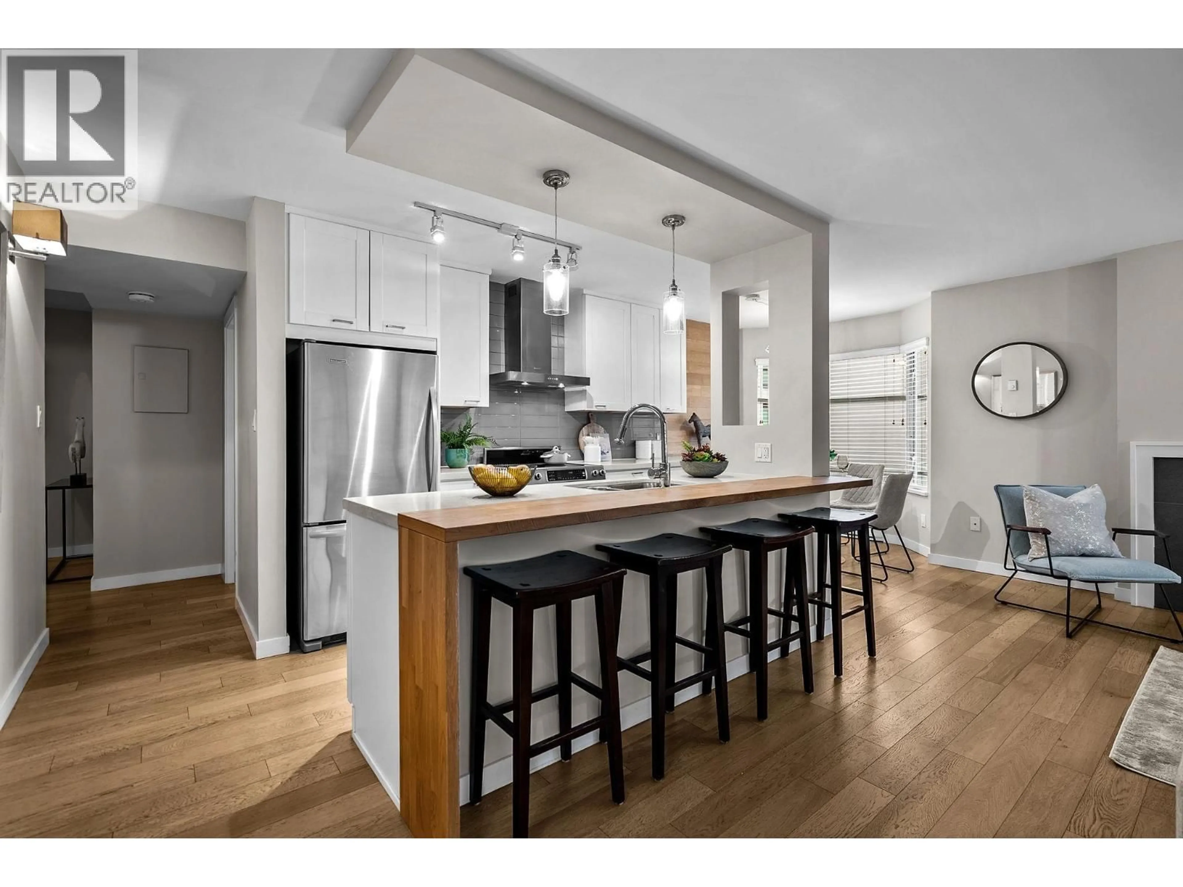Open concept kitchen, wood/laminate floor for 302 - 1263 BARCLAY STREET, Vancouver British Columbia V6E1H5
