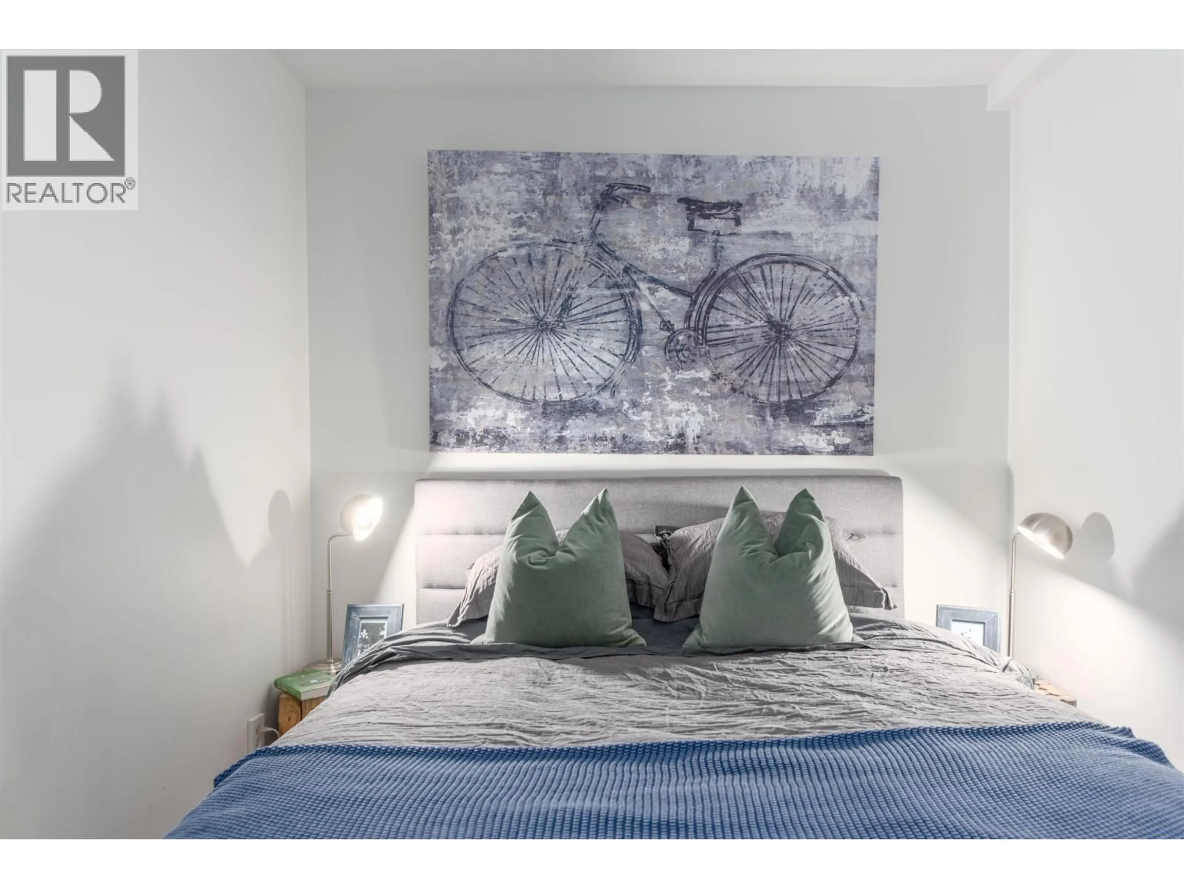 Bedroom with bed, wood/laminate floor for 202 - 788 8TH AVENUE, Vancouver British Columbia V5Z1E1