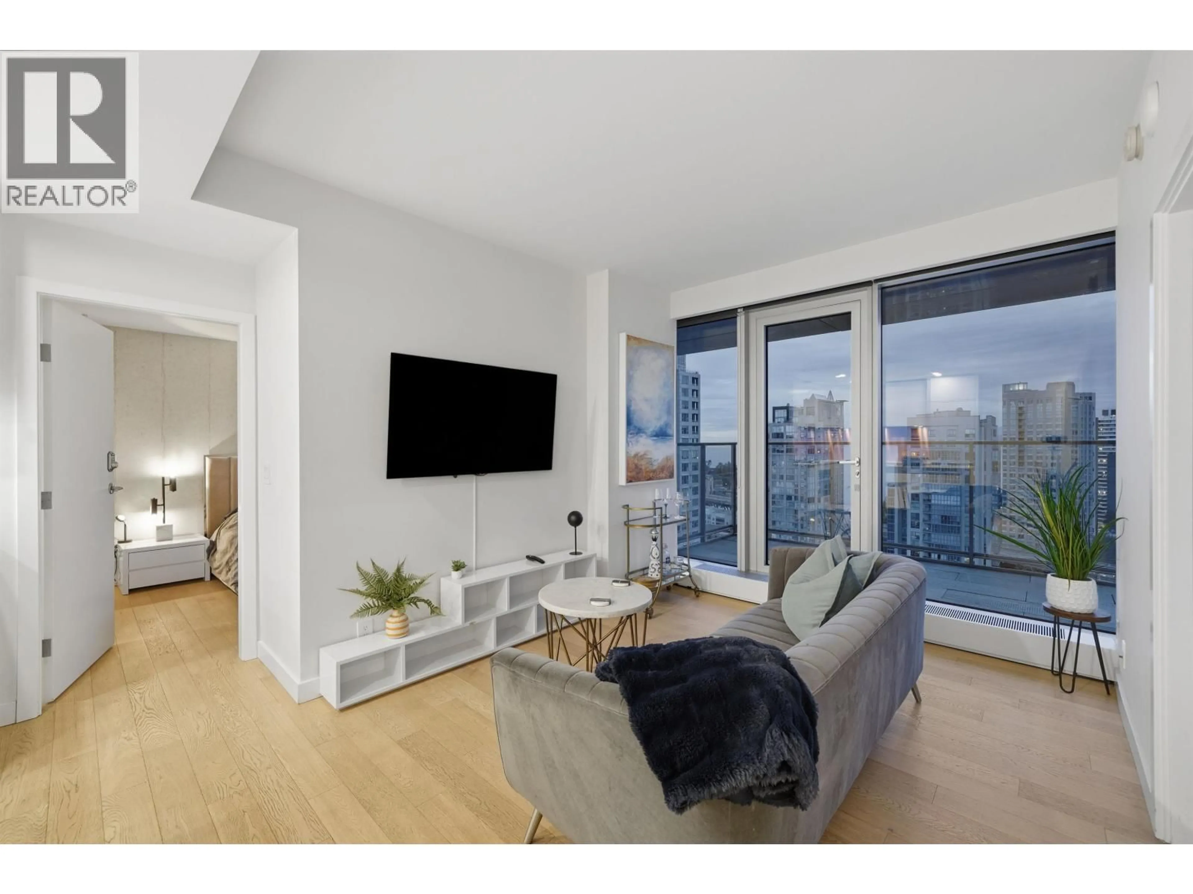 Living room with furniture, wood/laminate floor for 2506 - 1480 HOWE STREET, Vancouver British Columbia V6Z0G5