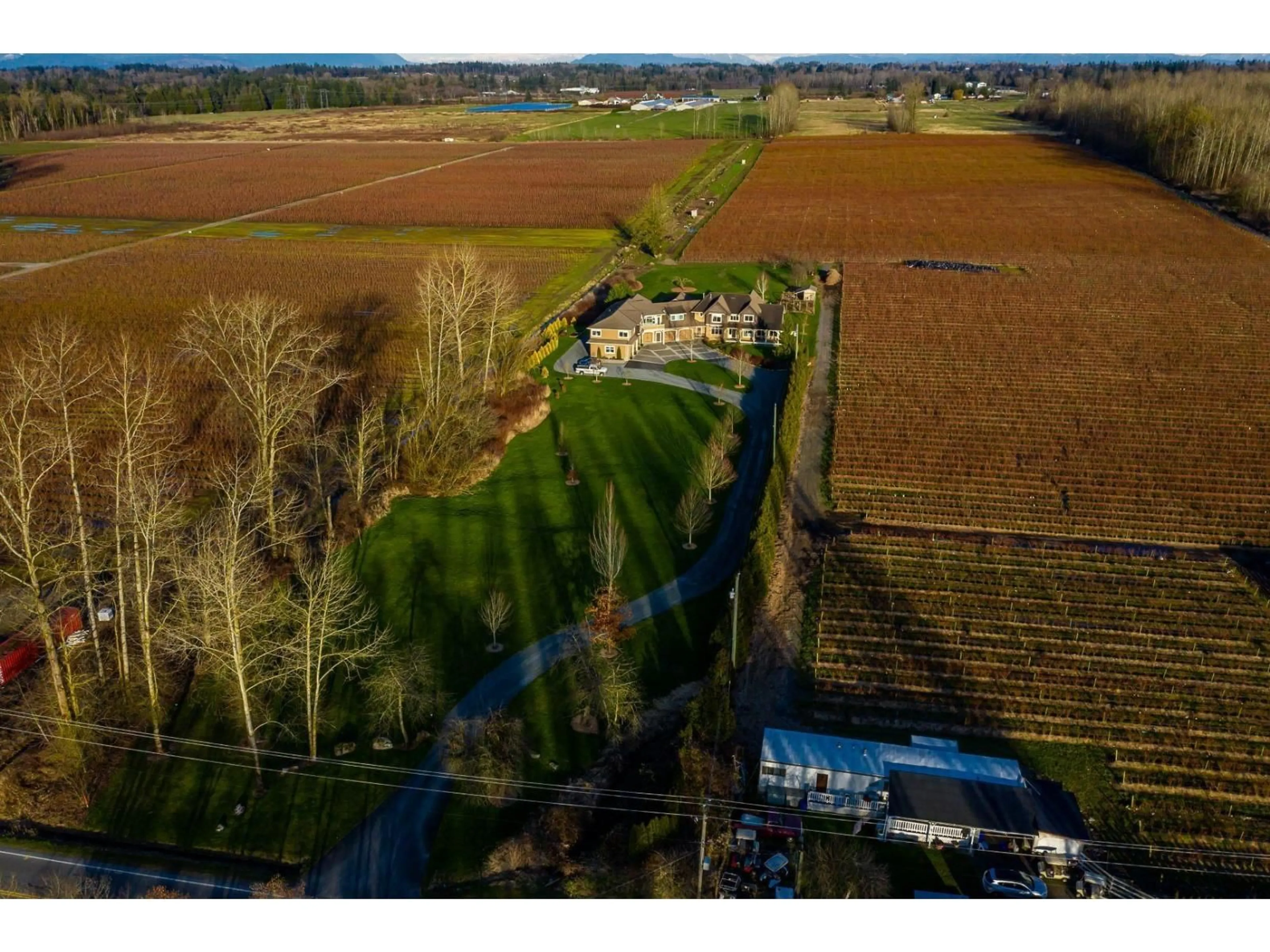 A pic from outside/outdoor area/front of a property/back of a property/a pic from drone, unknown for 3180 216, Langley British Columbia V2Z2E6