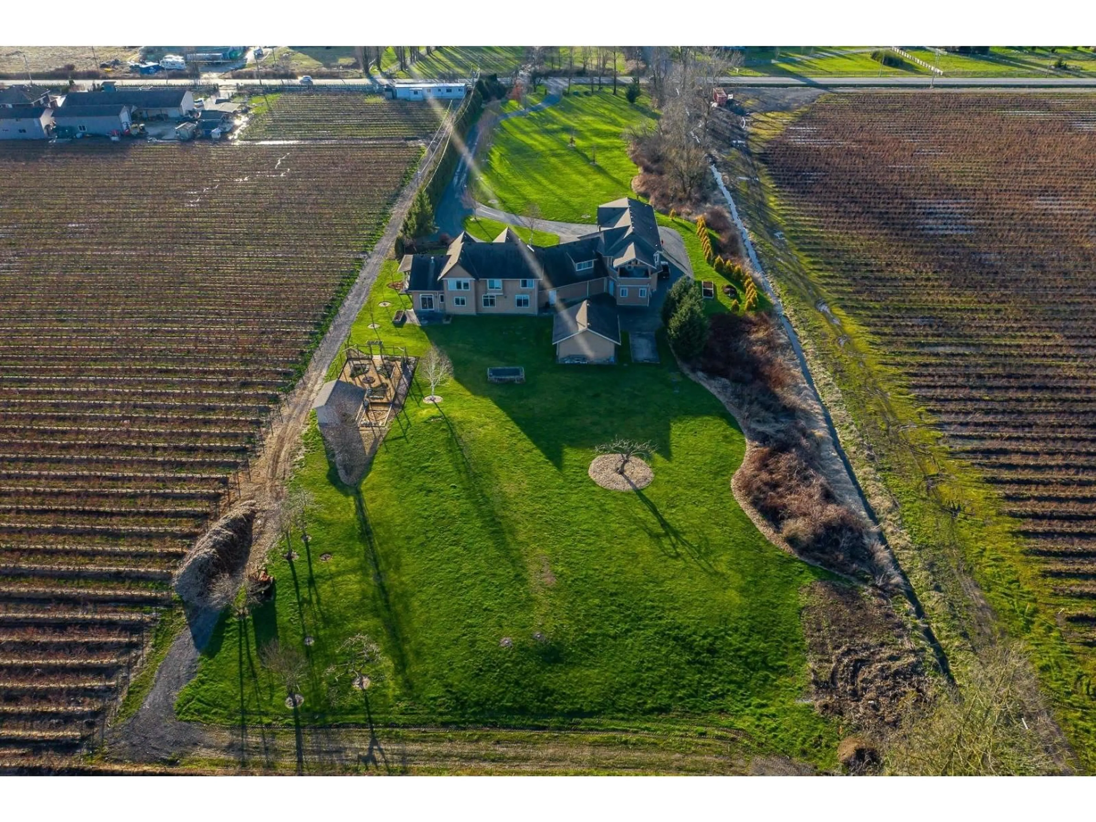 A pic from outside/outdoor area/front of a property/back of a property/a pic from drone, building for 3180 216, Langley British Columbia V2Z2E6