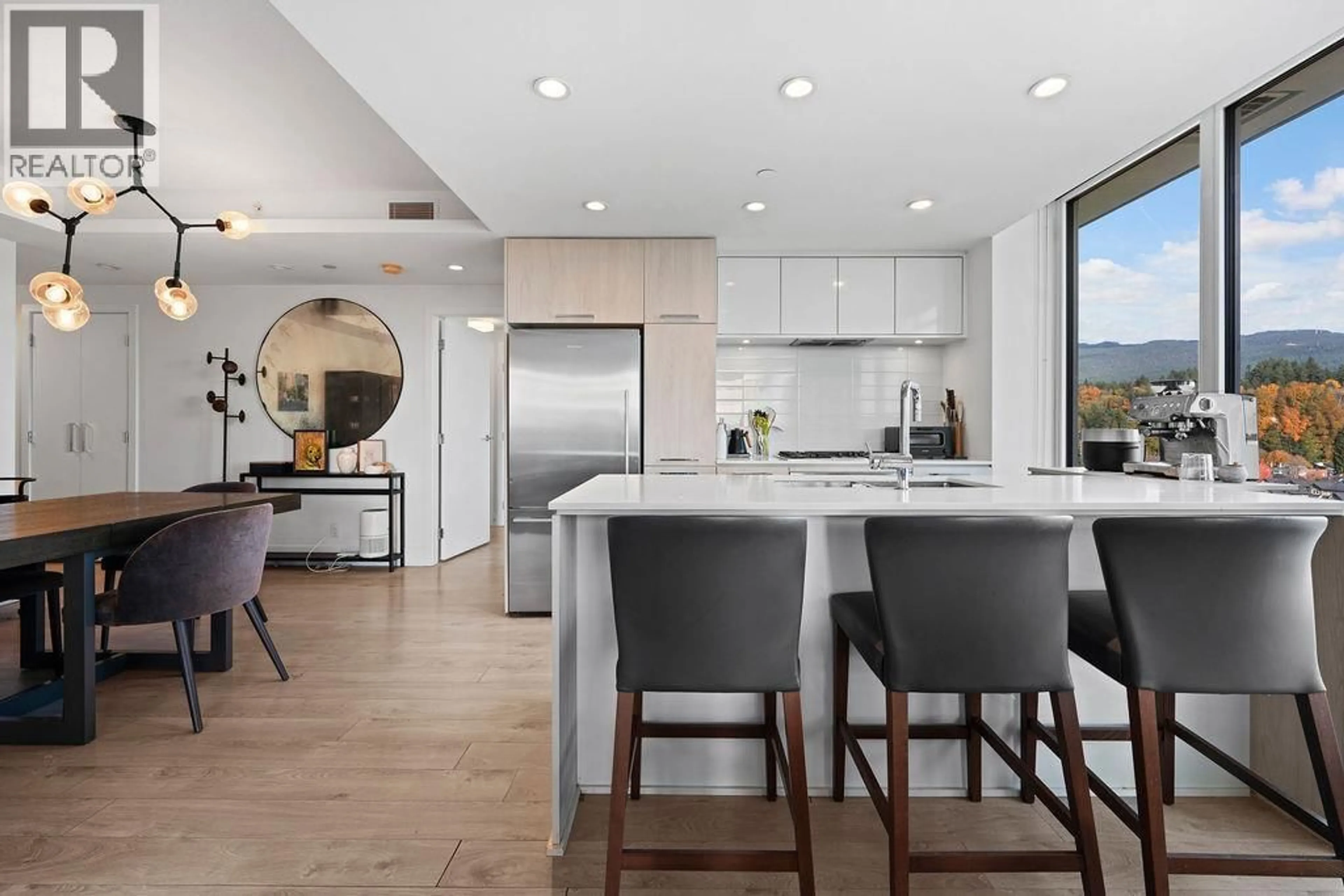 Open concept kitchen, ceramic/tile floor for 1003 - 680 SEYLYNN CRESCENT, North Vancouver British Columbia V7J0B5