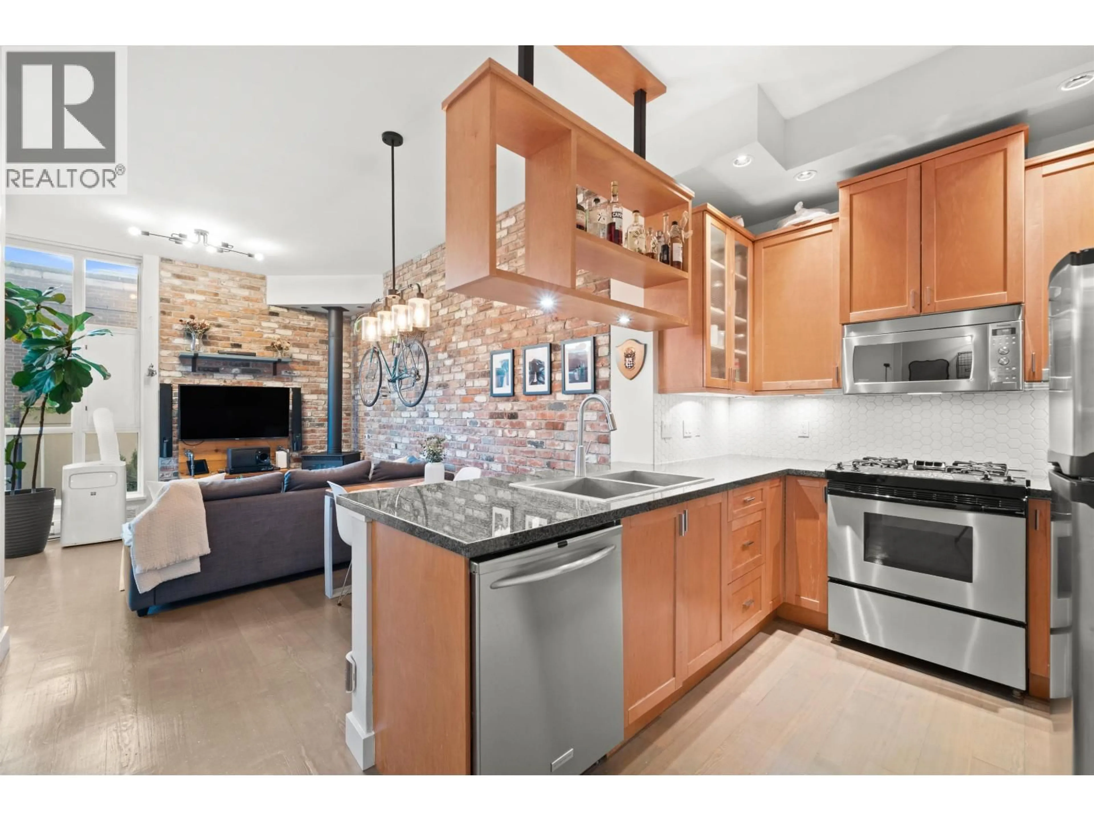 Open concept kitchen, ceramic/tile floor for 207 - 2515 ONTARIO STREET, Vancouver British Columbia V5T4V4